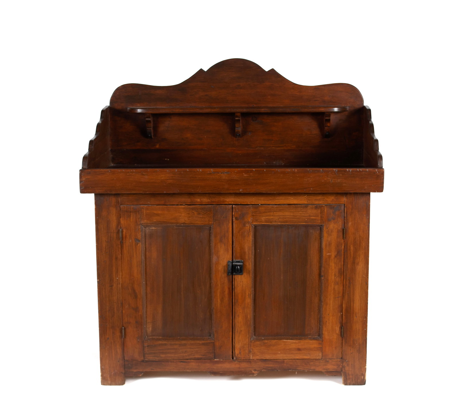 STAINED PINE DRYSINK: STAINED PINE DRYSINK American, 19th century. Opened recessed top with rolling top rail and short shelf below, all over two cupboard doors below. 47 1/2 x 43 1/4 x 23 3/4 in. (120.7 x 109.9 x 60.3 cm.)