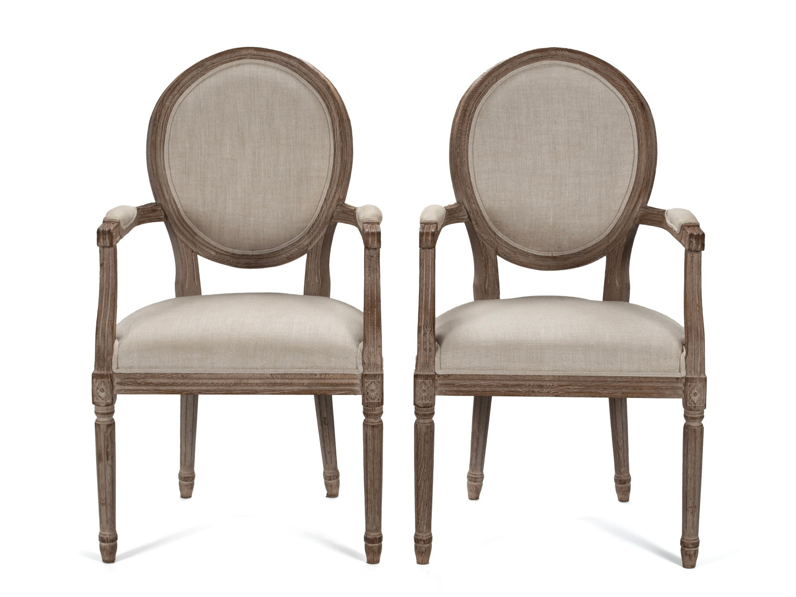 PAIR OF LOUIS XVI STYLE OPEN ARMCHAIRS BY RESTORATION HARDWARE: PAIR OF LOUIS XVI STYLE OPEN ARMCHAIRS BY RESTORATION HARDWARE American, 20th century. Oval padded backs with matching seats, on tapering fluted legs. Each: 40 x 23 x 23 in. (101.6 x 58.4 x 58.4 cm.)
