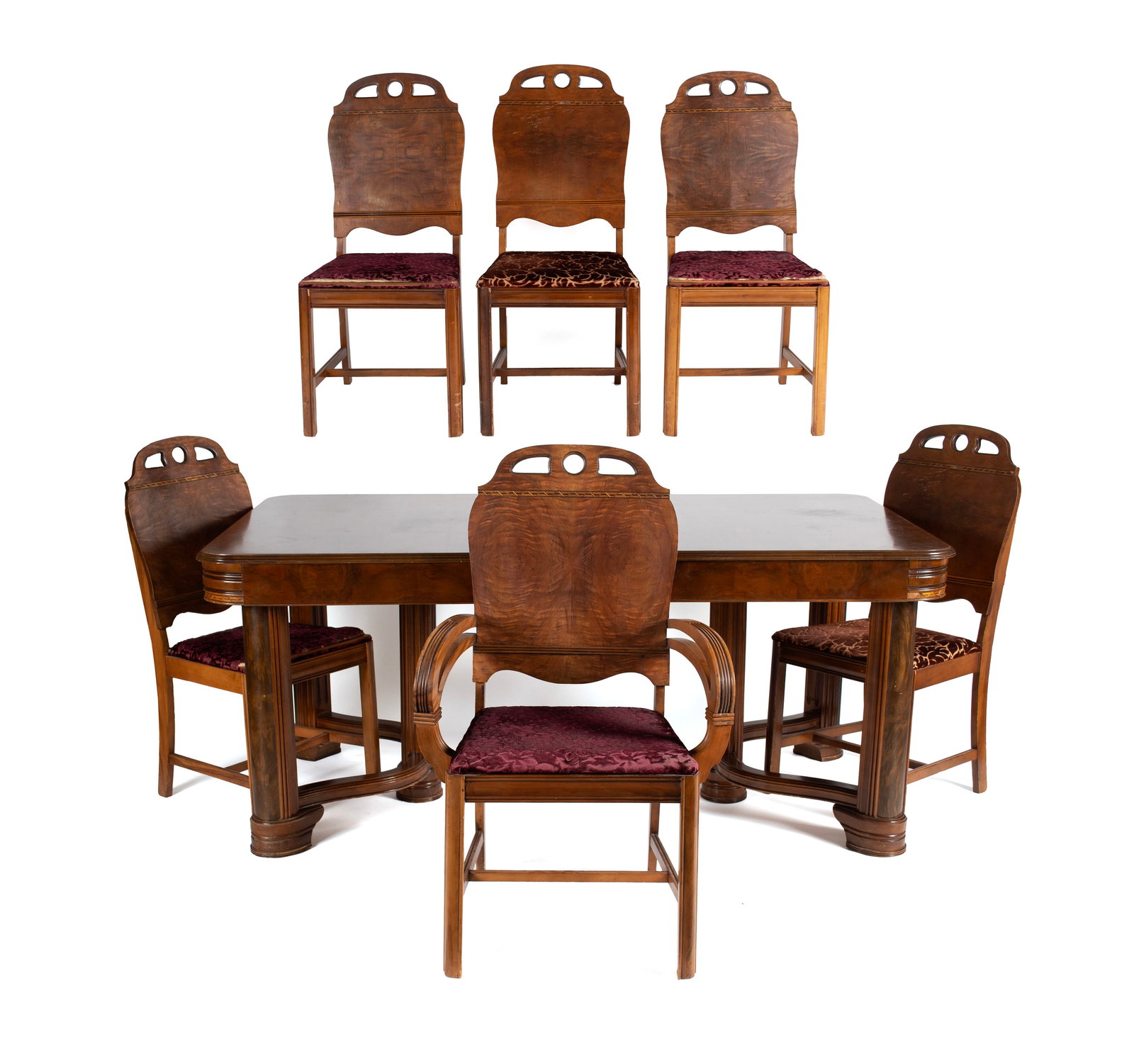 SEVEN PIECE ART DECO DINING ROOM SET: SEVEN PIECE ART DECO DINING ROOM SET American, circa 1930. Set of six (6) dining chairs (one an armchair) with inlay highlighted solid panel backs showing pierced upper rails and quarter-rounded front