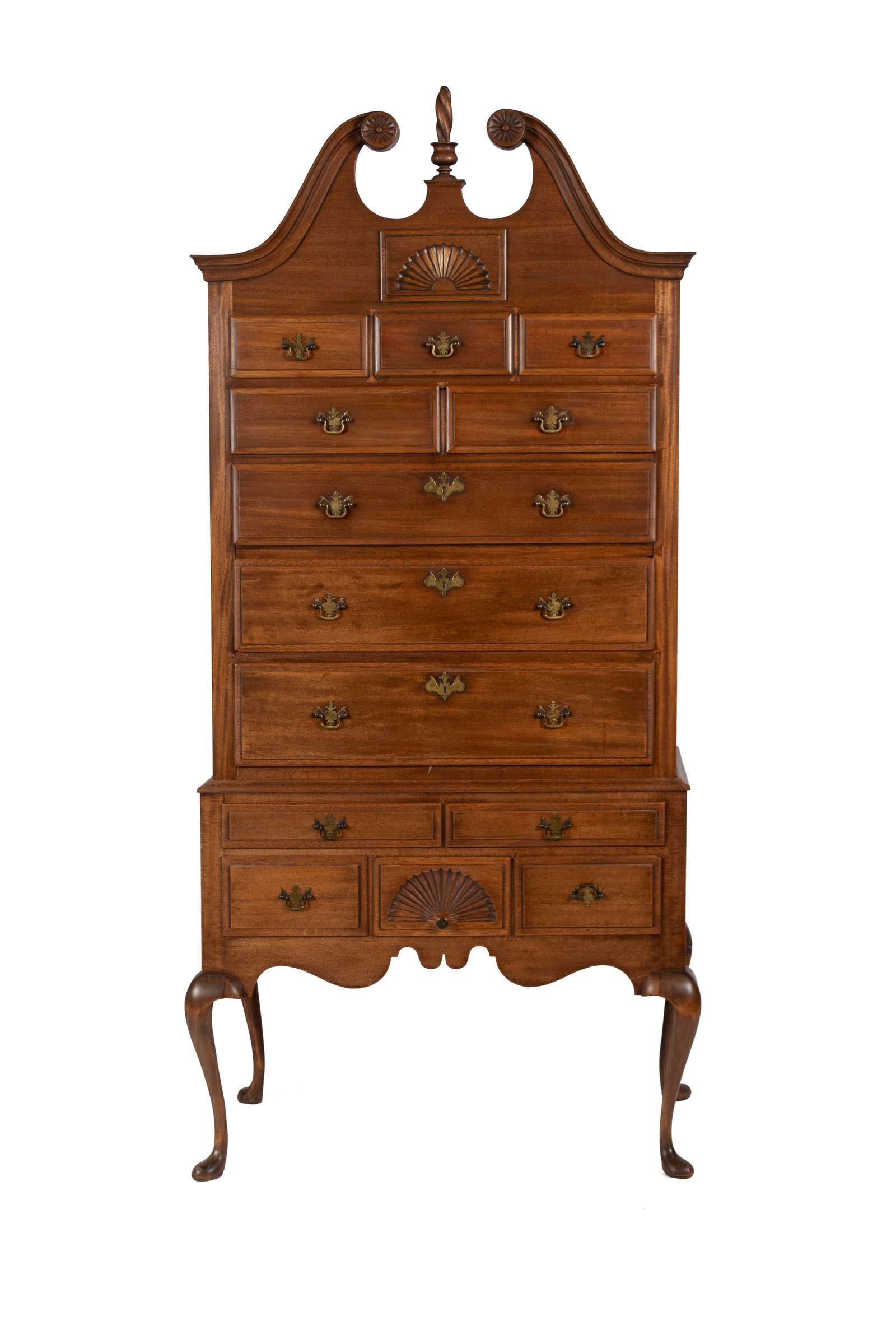 QUEEN ANNE STYLE HIGHBOY: QUEEN ANNE STYLE HIGHBOY American, 20th century, in two parts. Broken swan neck pediment with central flame finial, the speaker hidden behind the pediment and facing upward, with decorative fan form