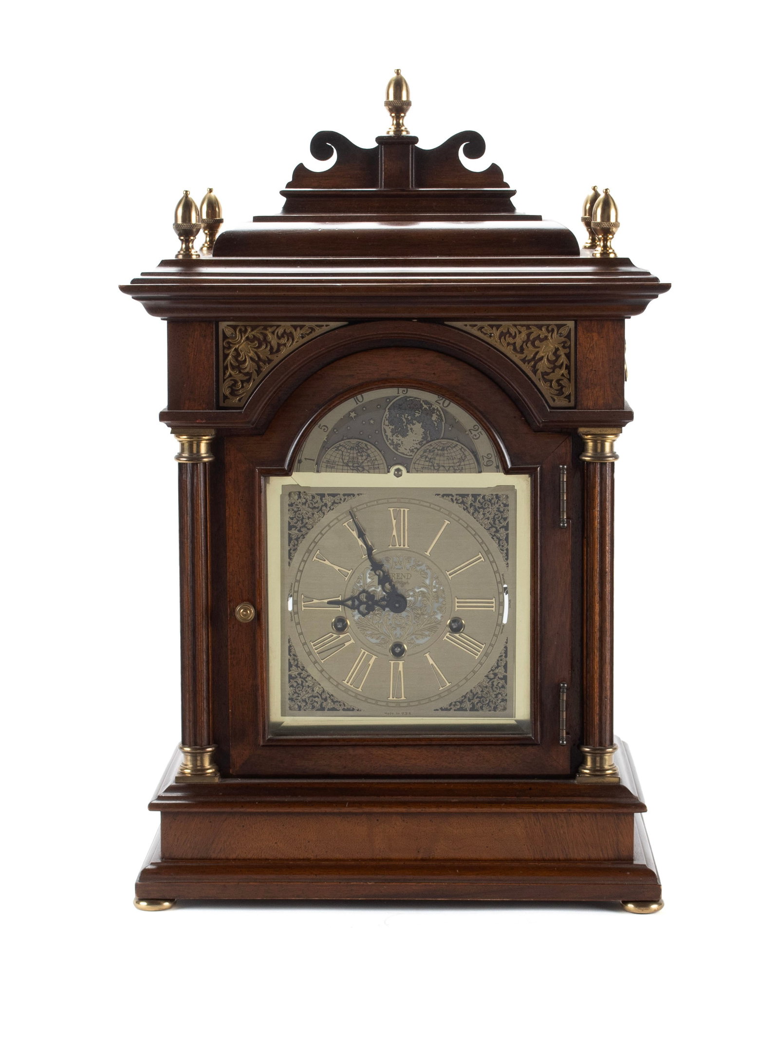 SLIGH TREND BRACKET CLOCK: SLIGH TREND BRACKET CLOCK American, late 20th century, limited edition numbered 142/1000. Architectural case with brass finials over the brass dial and highlights. 23 1/2 x 15 x 9 1/2 in. (59.7 x
