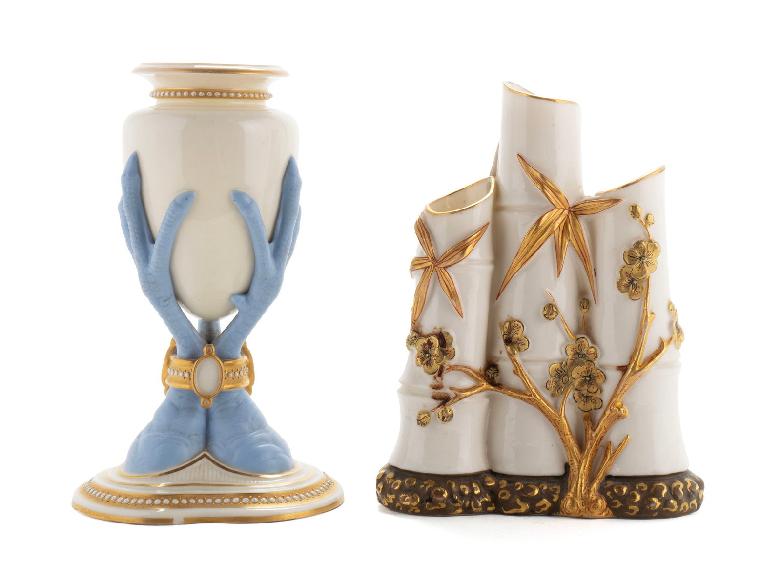 TWO ROYAL WORCESTER PORCELAIN VASES: TWO ROYAL WORCESTER PORCELAIN VASES English, late 19th century. Including a St. Aubyn spill vase with blue chicken feet and gilt highlights, and a bamboo triple bud vase. Both with stamped and