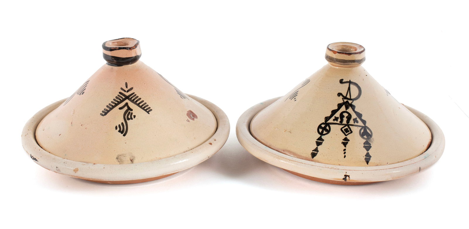 PAIR OF MOROCCAN CLAY TAJINE: PAIR OF MOROCCAN CLAY TAJINE 20th century. With slip decoration. Each: 4 1/2 x 8 in. (11.4 x 20.3 cm.)