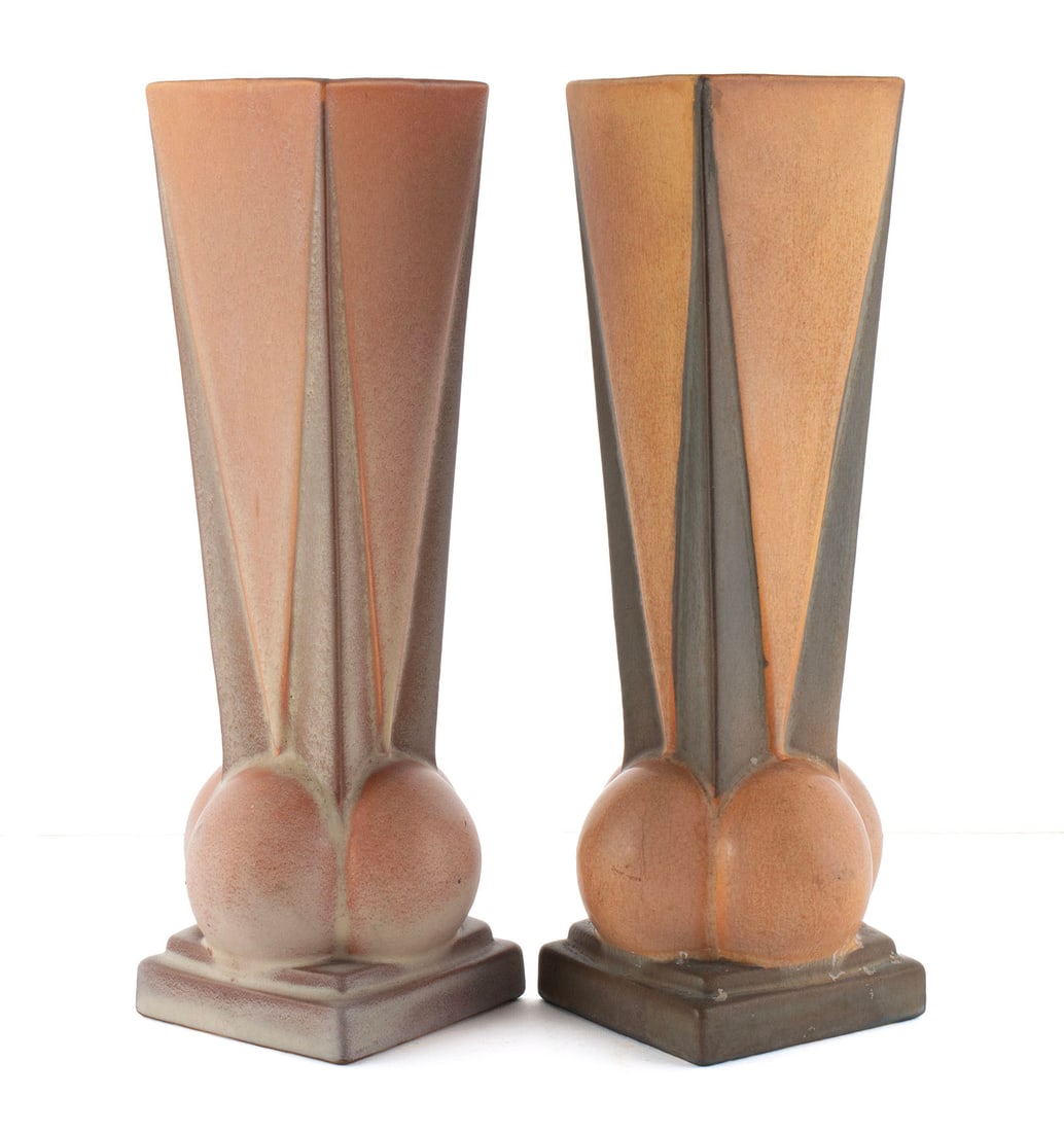 PAIR OF ROSEVILLE FUTURA 4-BALL VASES: PAIR OF ROSEVILLE FUTURA 4-BALL VASES American, designed by Frank Ferrell circa 1928, unmarked. Square flaring form with four balls at the bottom, on a square base. Each: 12 1/4 in. (31.1 cm.)