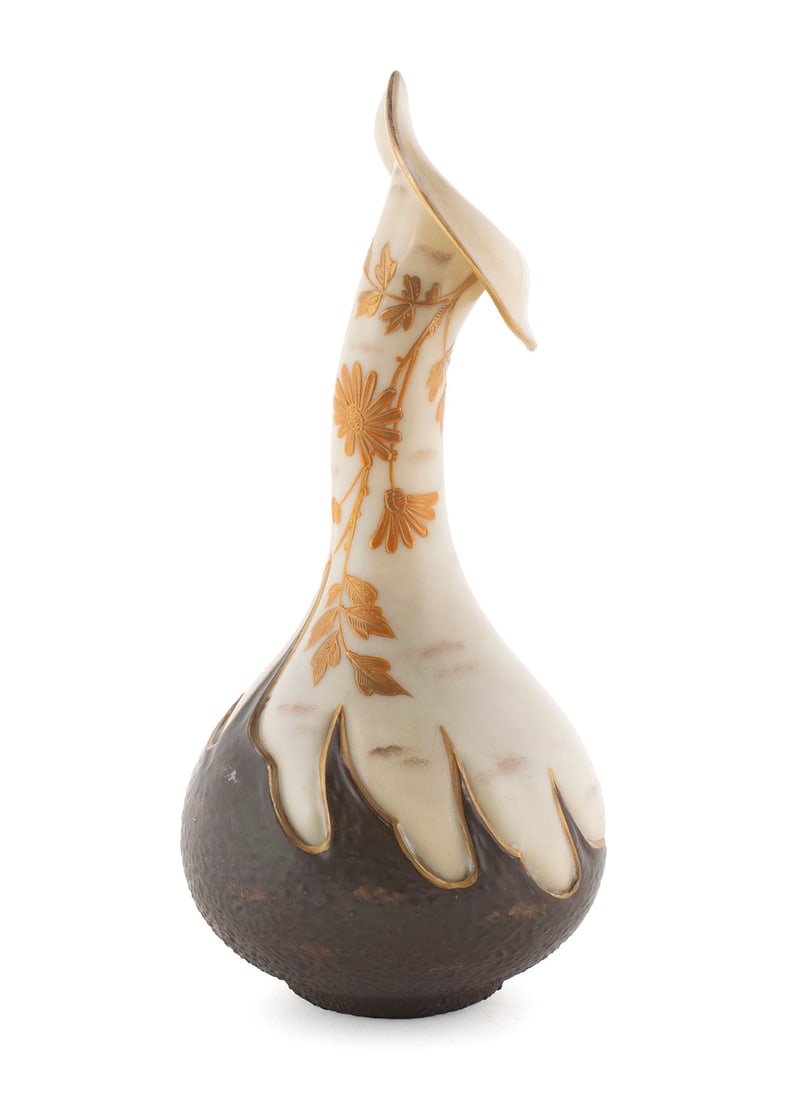 ART NOUVEAU MILK GLASS VASE: ART NOUVEAU MILK GLASS VASE American, late 19th century. Bottle form with jack-in-the-pulpit opening on top, decorated with golden flowers on the beige ground with brown lower portion. 12.40 in.
