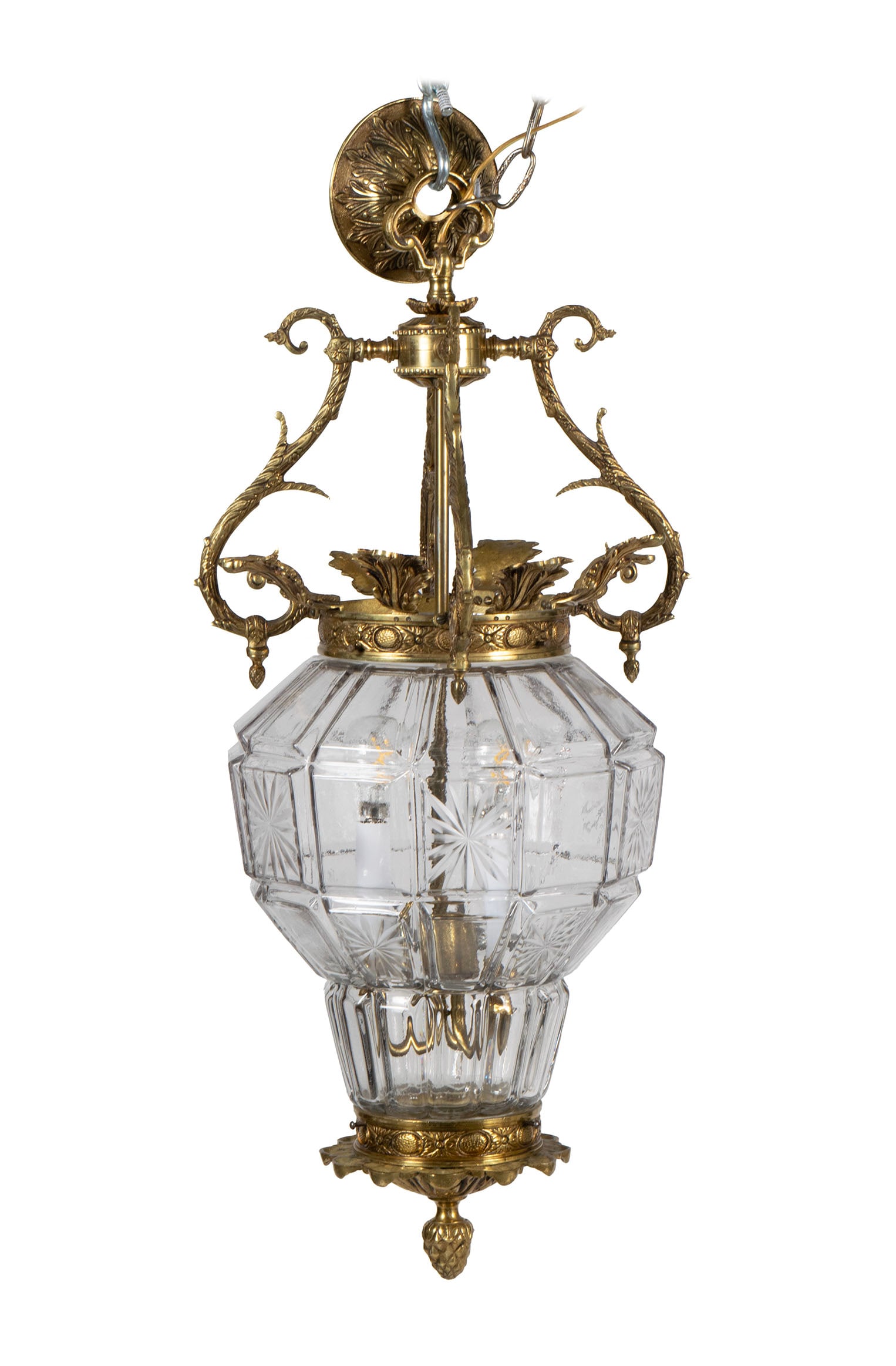 FRENCH STYLE HALL LANTERN: FRENCH STYLE HALL LANTERN American, 20th century. Gilt metal with scrolling and foliate highlights, holding the glass shade with wheel etched panels, brass acorn drop finial below. 30 in. (76.2 cm.)