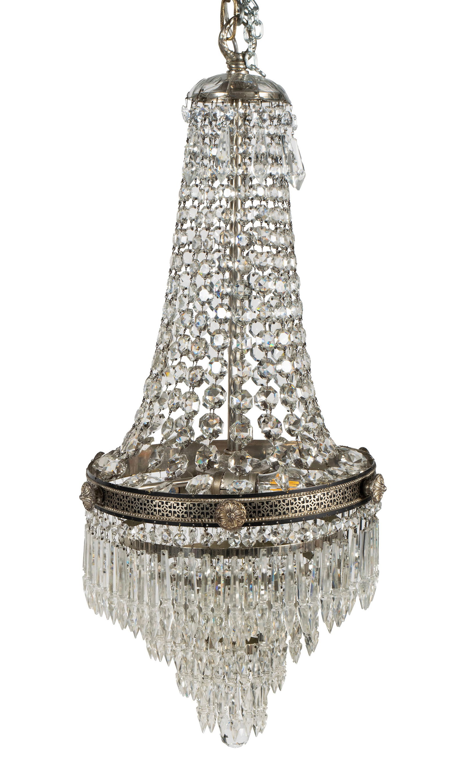 CONTINENTAL WEDDING CAKE CHANDELIER: CONTINENTAL WEDDING CAKE CHANDELIER 20th century. Rows of draping circular crystal prisms drop from the ceiling plate down to the circular silver decorated ring, with graduated rows of elongated