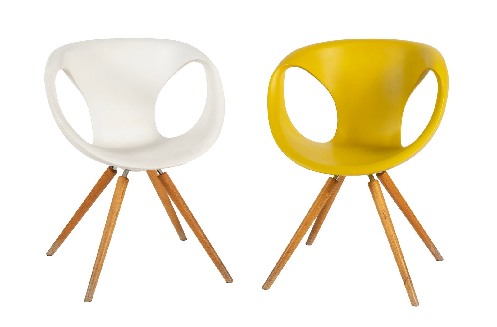 TWO 'UP' CHAIRS BY TONON: TWO 'UP' CHAIRS BY TONON Italian, designed by Martin Ballendat. Two (2) chairs with white and mustard polyurethane shells on wooden legs, marked under seat. Each: 32 1/4 x 24 in. (81.9 x 61 cm.)