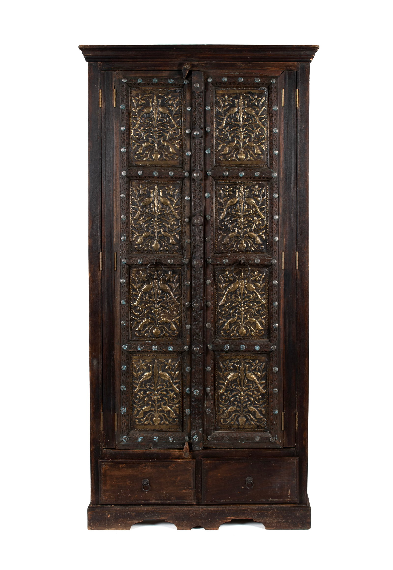 ANGLO INDIAN WARDROBE: ANGLO INDIAN WARDROBE 20th century. Pair of long doors with gilt repousse decorative panels running full length covering two drawers and three open shelves to the interior, two drawers near the