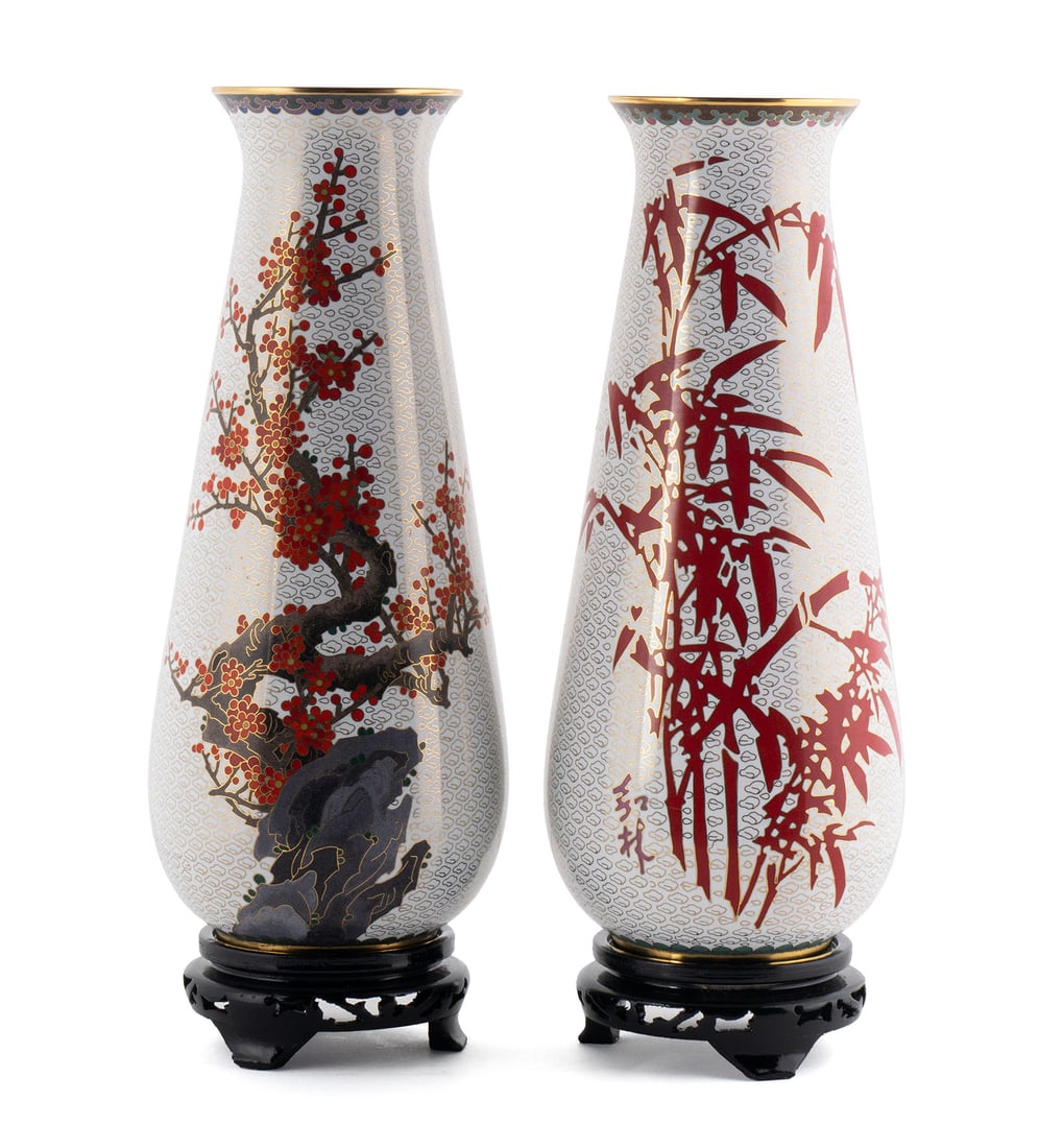 PAIR OF TIAN ZHU CLOISONNE VASES: PAIR OF TIAN ZHU CLOISONNE VASES Chinese, 2005, designed by Jianguo Wang. Plum bush in full bloom to one vase, bamboo plant to the other, both on a white ground. Each: 12 in. (30.5 cm.)
