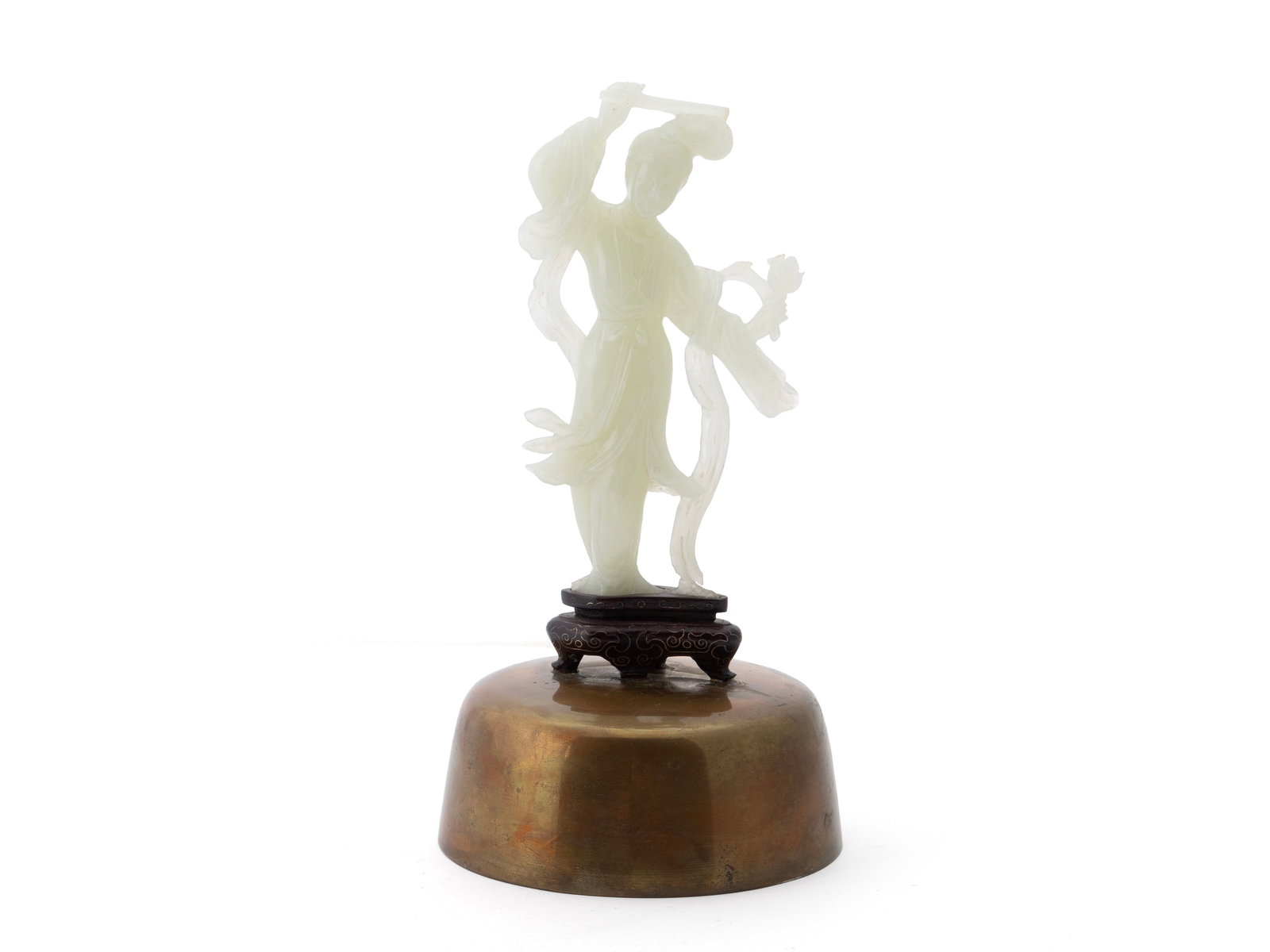 CHINESE WHITE JADE FIGURE OF GUANYIN: CHINESE WHITE JADE FIGURE OF GUANYIN 20th century. Standing Guanyin on wood stand mounted to brass bell inset in glass case, the piece shows damage with two parts unattached. Jade: 7 3/4 x 4 in.
