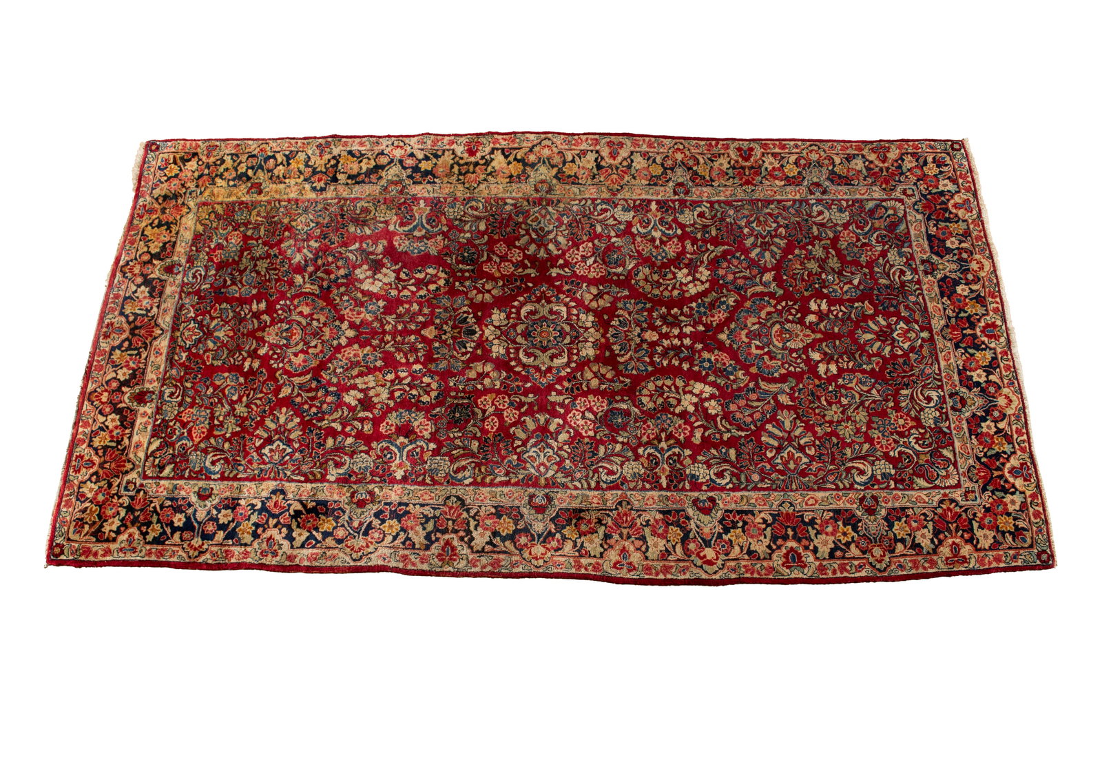 SAROUK HALL RUG: SAROUK HALL RUG Persian, 3rd quarter 20th century. Colorful floral bouquets and flowering vines cover the red field, navy border with floral guard borders. 11 ft. 7 in. x 6 ft. 1 in.