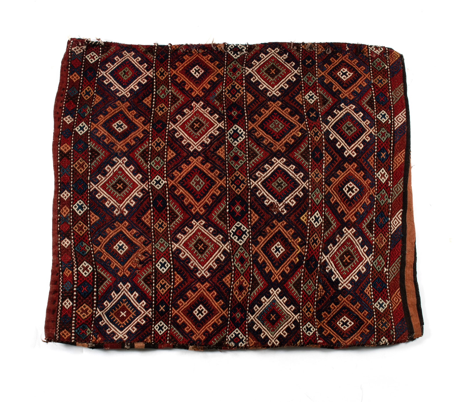 LARGE TURKISH BAG: LARGE TURKISH BAG Turkish, 20th century. Rows of colorful latch hook medallions in shades of red, blue, and ivory. 3 ft. 9 in. x 3 ft. 4 in.