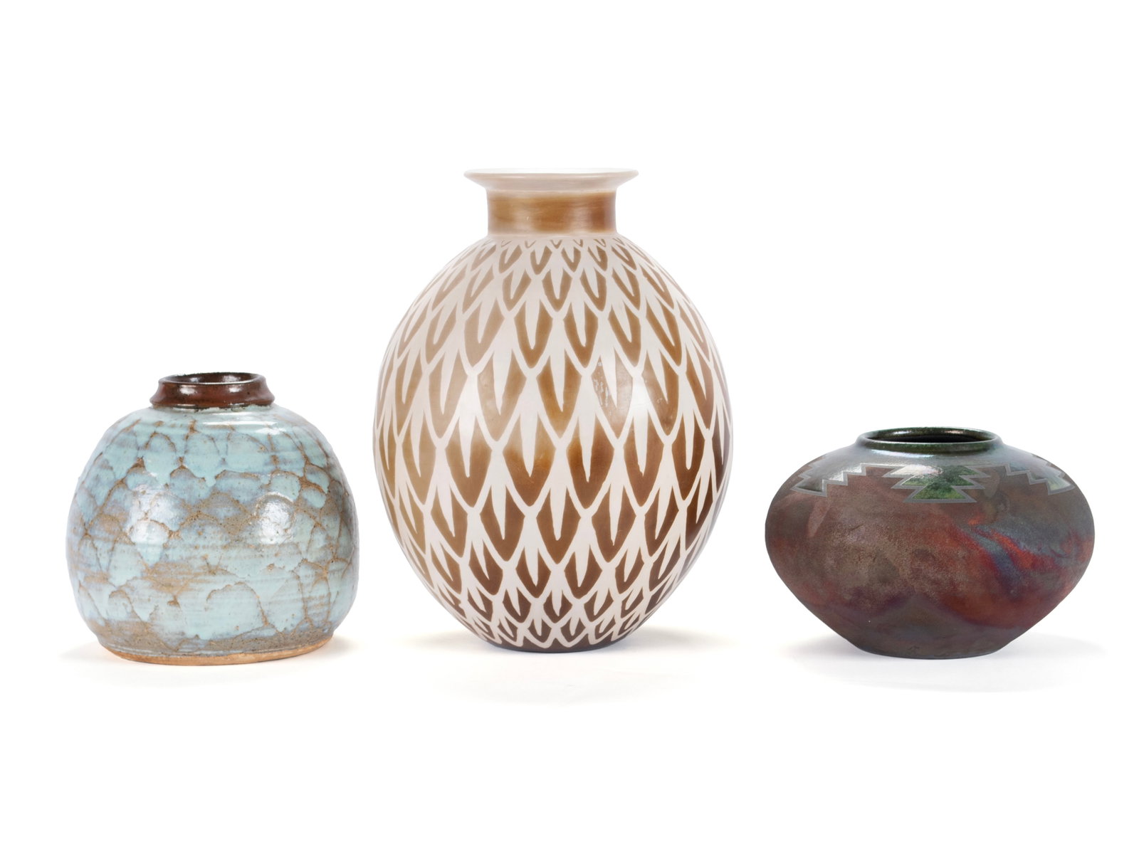 THREE CONTEMPORARY CERAMIC POTS: THREE CONTEMPORARY CERAMIC POTS Including a vase by Henry Carmen, an R Kevin Kelley iridescent raku pot, and another with an unidentified signature. Largest: 13 1/4 in. (33.7 cm.) The Collection of