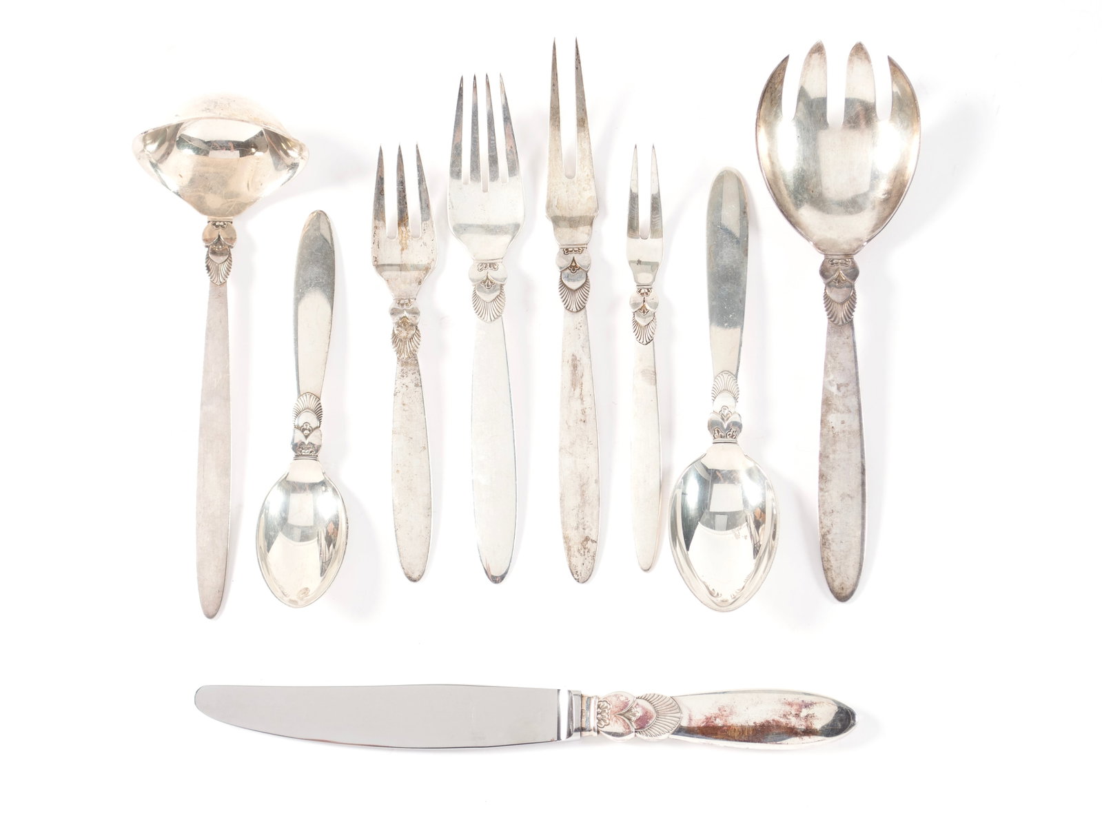 GEORGE JENSEN 'CACTUS' STERLING SILVER FLATWARE SET: GEORGE JENSEN 'CACTUS' STERLING SILVER FLATWARE SET 20th century. Forty-four (44) pieces, including eight (8) dinner knives, eight (8) forks, eight (8) salad forks, eight (8) teaspoons, eight (8)