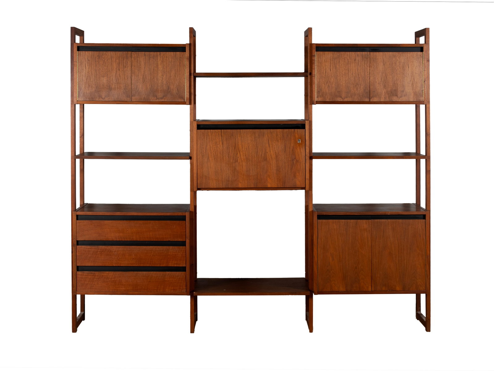 MCM WALL UNIT: MCM WALL UNIT 20th century. With multiple shelf and cabinet units including three two-door cabinets, a central drop front cabinet, and a three-drawer unit. 74 3/4 x 85 1/2 x 16 in. (189.9 x 217.2 x