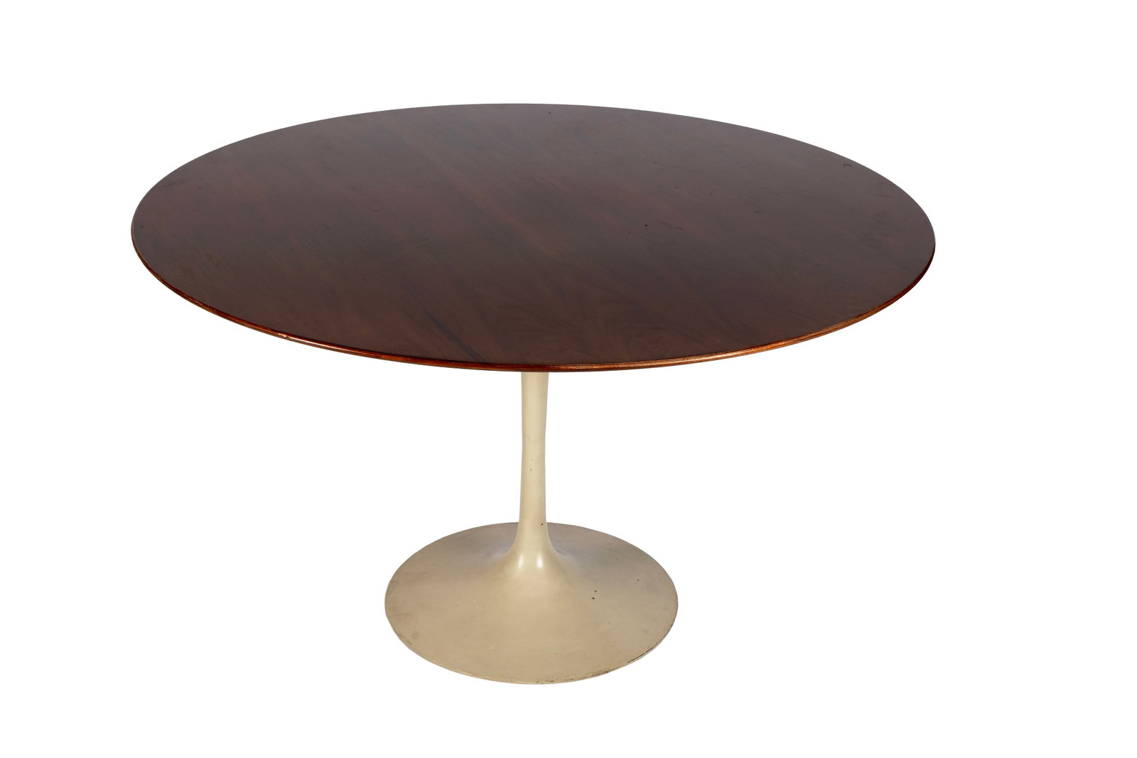 EERO SAARINEN FOR KNOLL 'TULIP' BREAKFAST TABLE: EERO SAARINEN FOR KNOLL 'TULIP' BREAKFAST TABLE American, mid-20th century. Walnut top with laminated metal base, label to underside of top. 28 x 47 1/4 in. (71.1 x 120 cm.) The Collection of Mrs.