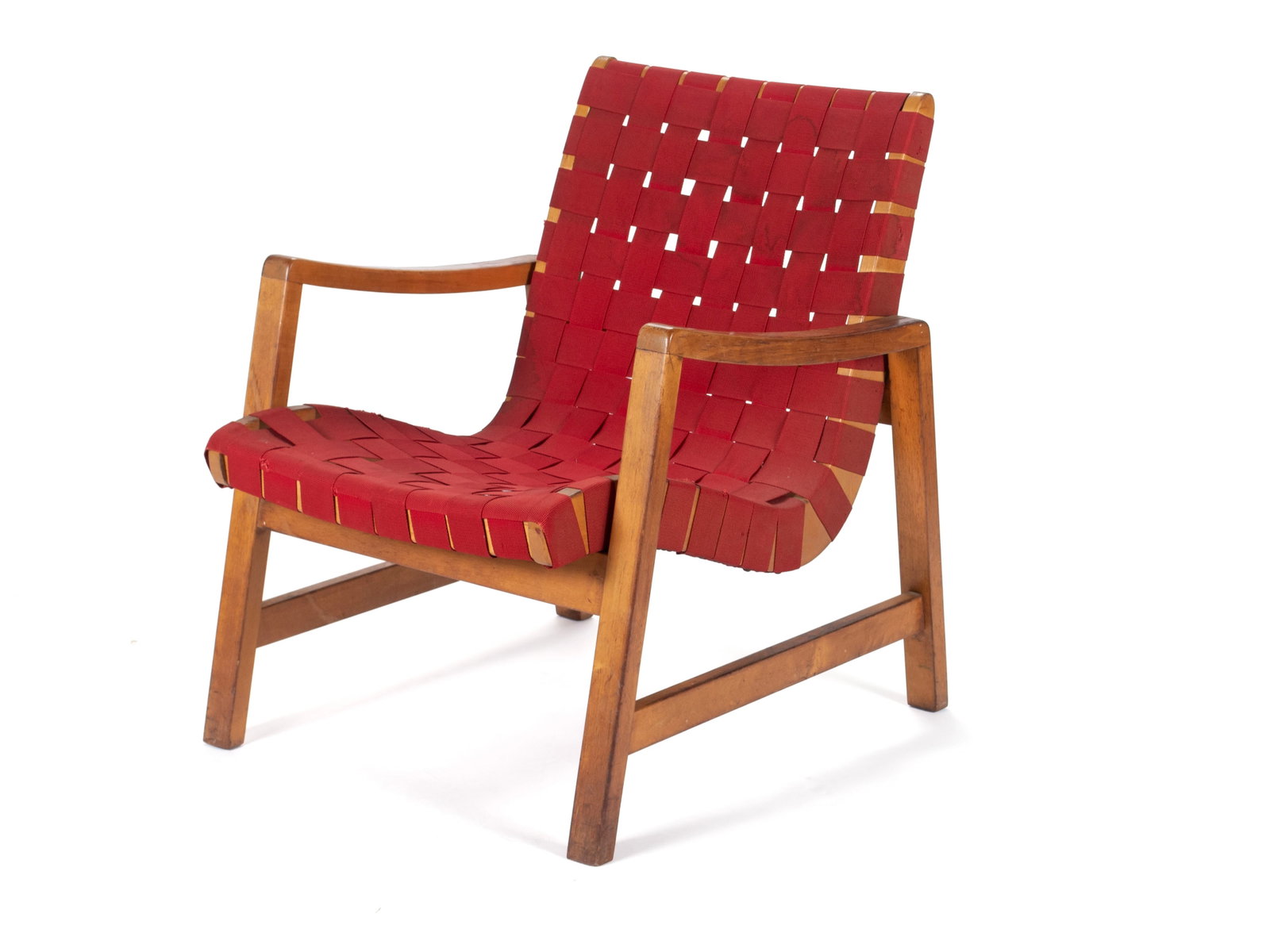 JENS RISOM FOR KNOLL 652 LOUNGE CHAIR: JENS RISOM FOR KNOLL 652 LOUNGE CHAIR American, mid-20th century. Maple frame with red canvas webbing. 29 1/2 x 24 x 27 in. (74.9 x 61 x 68.6 cm.)