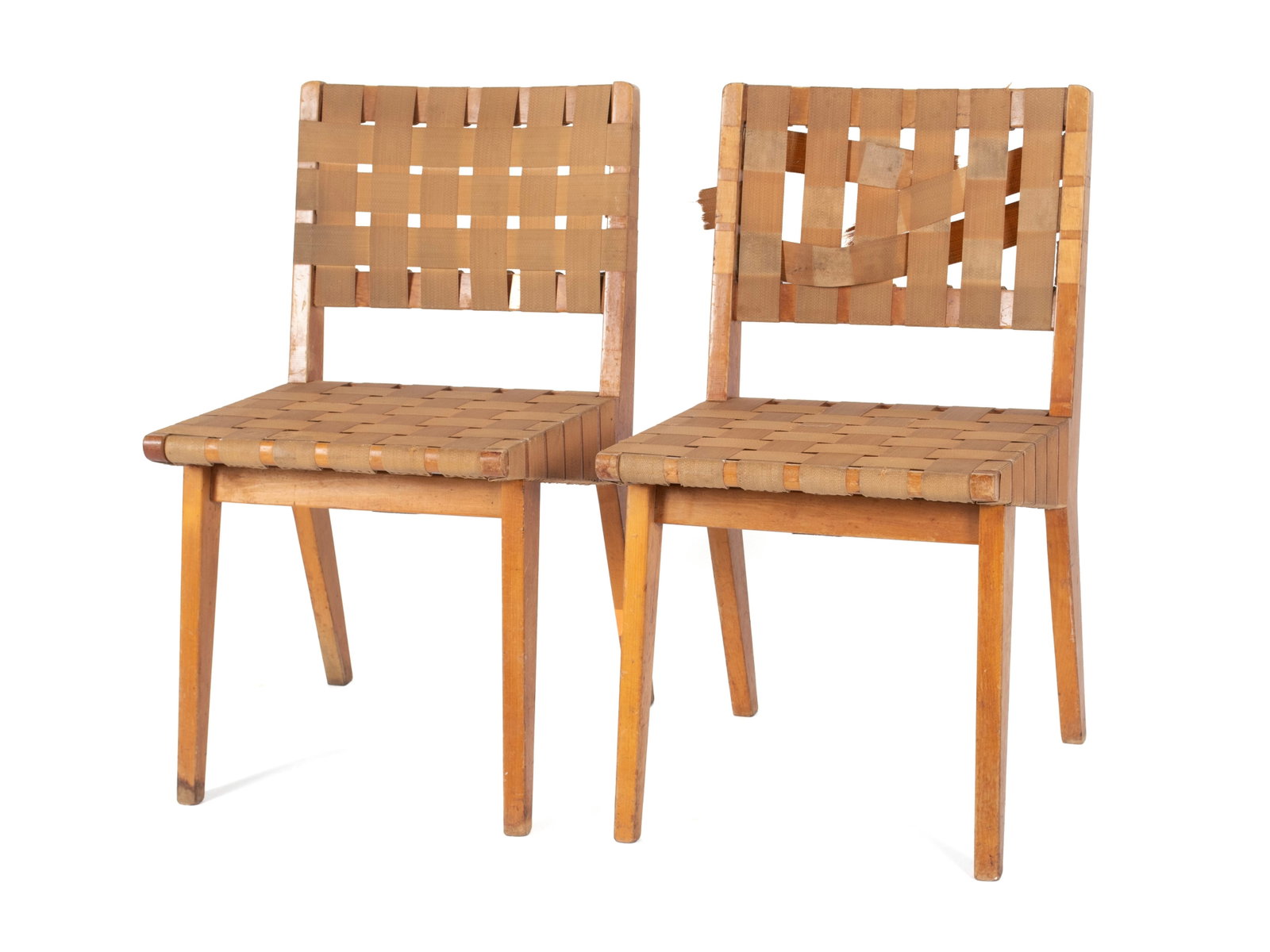 JENS RISOM FOR KNOLL PAIR OF 666 SIDE CHAIRS: JENS RISOM FOR KNOLL PAIR OF 666 SIDE CHAIRS American, 20th century. Birch frames with canvas webbing, labels for retailer Lammert's on underside. 30 3/4 x 17 1/4 x 20 in. (78.1 x 43.8 x 50.8 cm.)