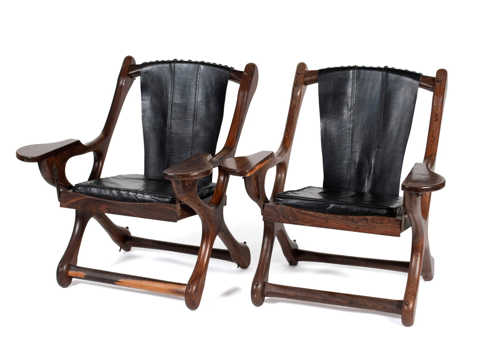 PAIR OF DON SHOEMAKER SLING CHAIRS: PAIR OF DON SHOEMAKER SLING CHAIRS Senal Co., Mexican, circa 1960's. Pair of Cocobolo and leather sling armchairs. 33 x 31 x 30 in. (83.8 x 78.7 x 76.2 cm.)