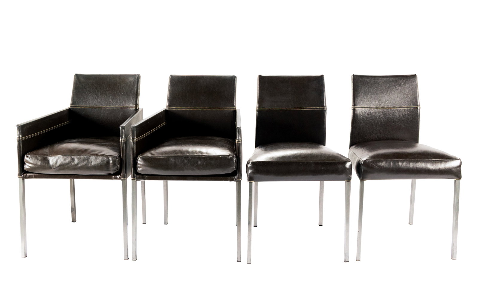 FOUR KFF 'TEXAS' DARK BROWN DINING CHAIRS: FOUR KFF 'TEXAS' DARK BROWN DINING CHAIRS German, 2nd half of the 20th century. Dark brown leather upholstered on steel tubular legs, two (2) armchairs and two (2) side chairs. 33 3/4 x 18 3/4 x 21