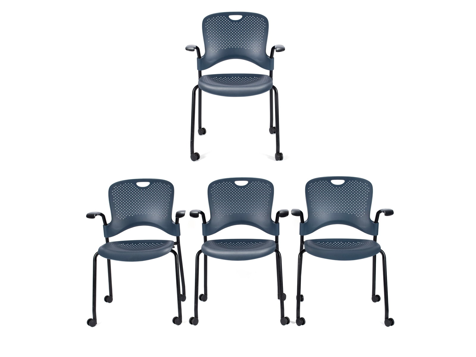 FOUR HERMAN MILLER 'CAPER' MULTIPURPOSE CHAIRS: FOUR HERMAN MILLER 'CAPER' MULTIPURPOSE CHAIRS 20th century. Set of four (4) stackable navy-blue mesh seat chairs with wheels. 32 1/2 x 20 x 24 in. (82.6 x 50.8 x 61 cm.) Ex Collection of Northland Co