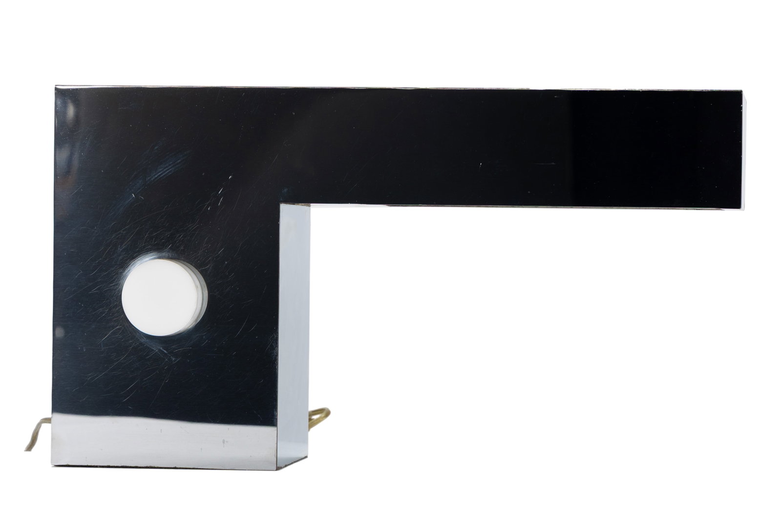 GEORGE KOVACS CHROME DESK LAMP: GEORGE KOVACS CHROME DESK LAMP American, mid-20th century. L-form chrome desk lamp, label to underside. 10 x 18 x 5 in. (25.4 x 45.7 x 12.7 cm.) The Collection of Mrs. Mary Jane Bodine, formerly Mrs.