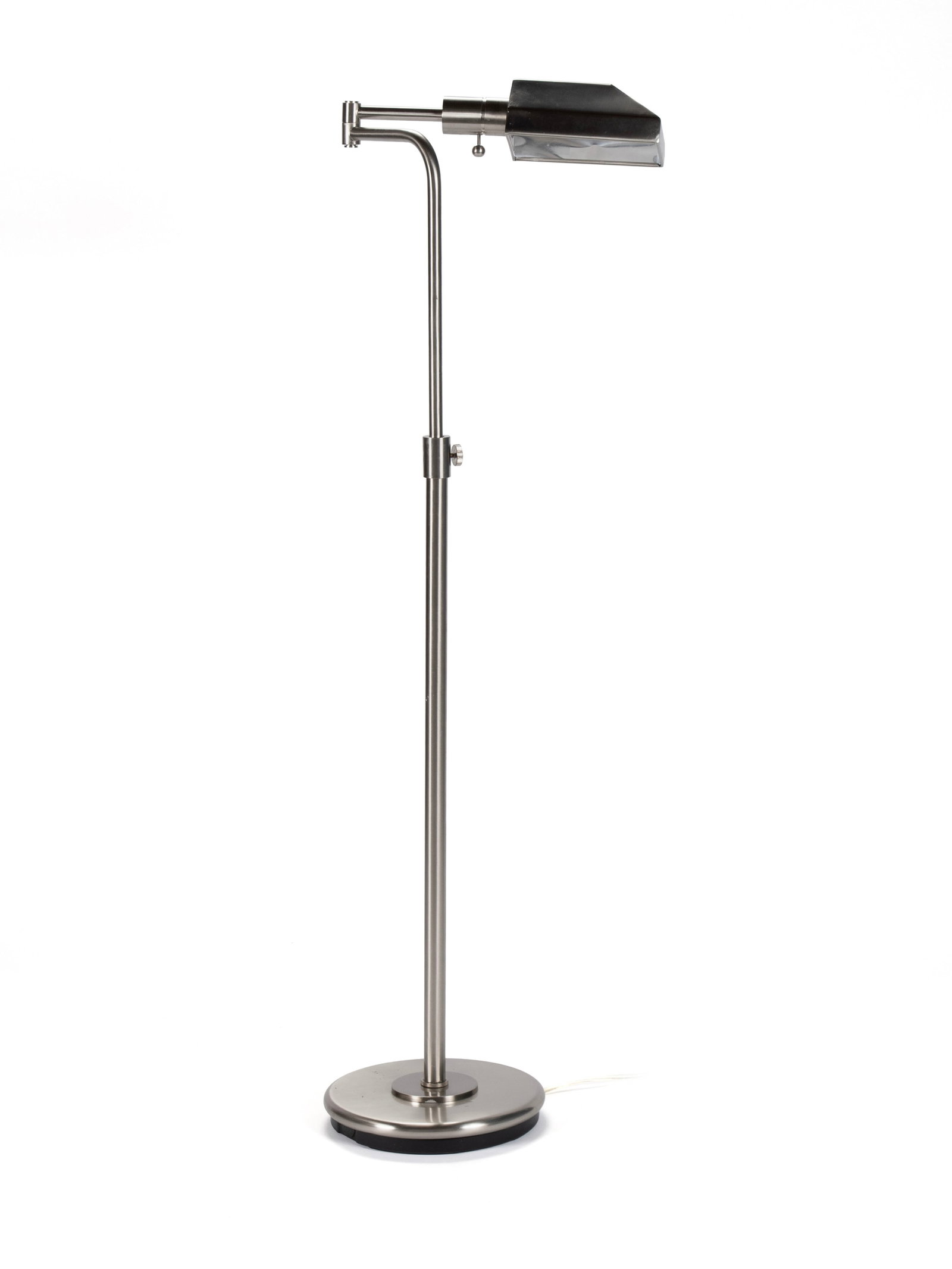 MODERN PHARMACY FLOOR LAMP: MODERN PHARMACY FLOOR LAMP 20th century. Polished metal adjustable floor lamp in the style of Casella. 46 x 25 in. (116.8 x 63.5 cm.) The Collection of Mrs. Mary Jane Bodine, formerly Mrs. Mary Jane