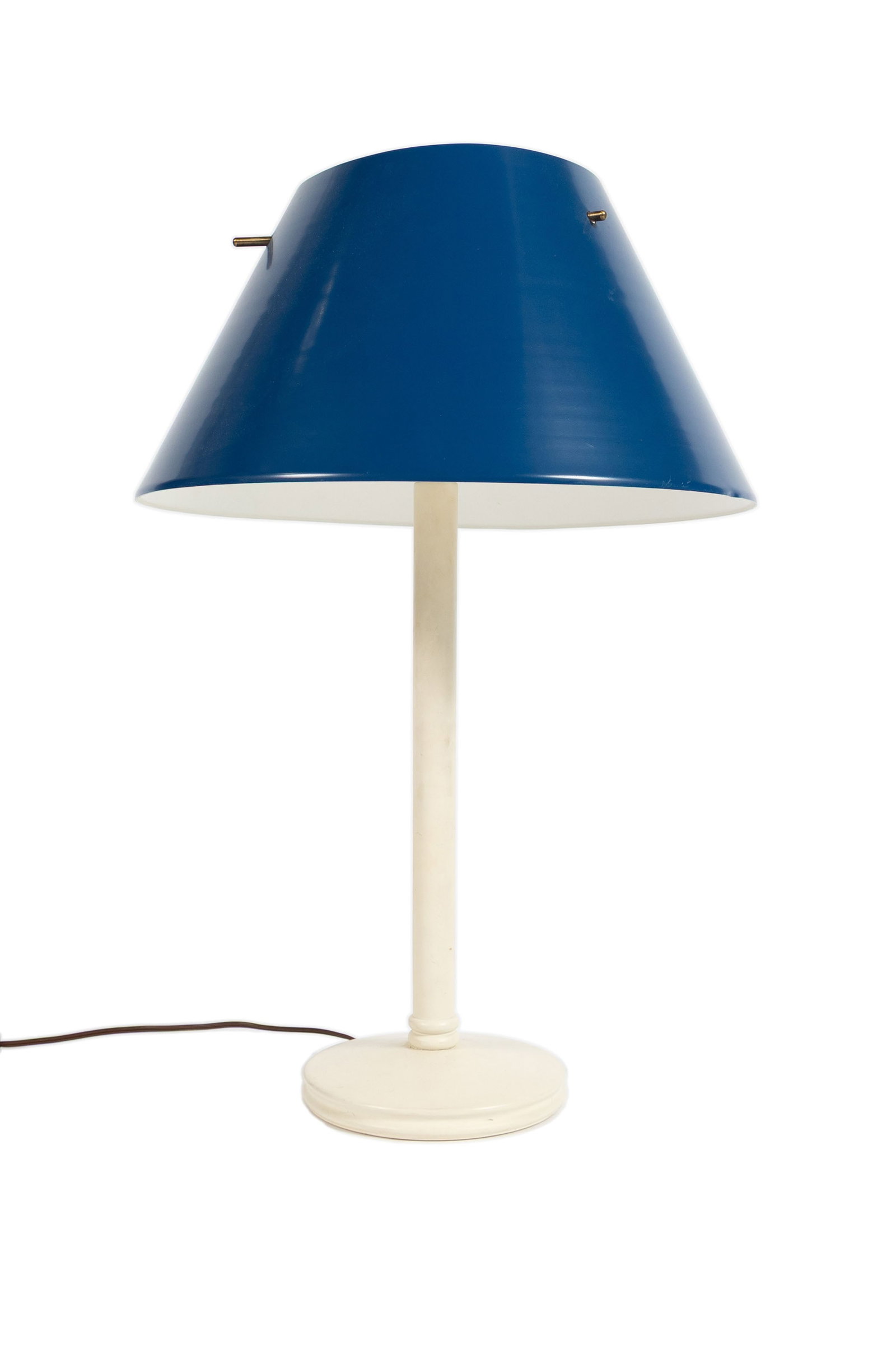 MCM TABLE LAMP BY HANS JAKOBSSON: MCM TABLE LAMP BY HANS JAKOBSSON Swedish, 20th century, labeled on the shade. Conical blue shade on the straight white metal standard with circular base. 23.30 x 16 x 16 in. (59.2 x 40.6 x 40.6 cm.)