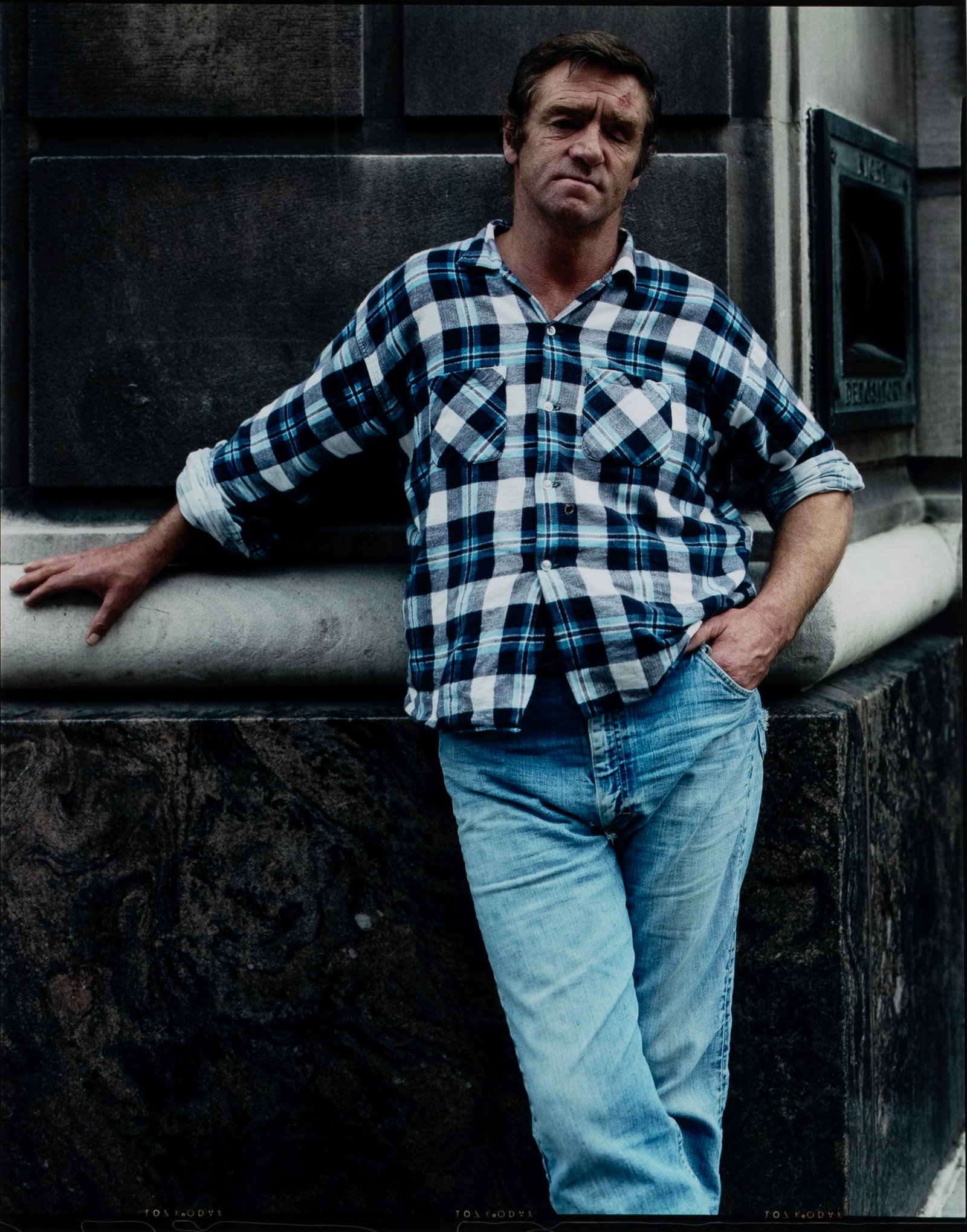 BRUCE WRIGHTON (AMERICAN, 1950-1988): Bruce Wrighton American, 1950-1988 Man in Blue Plaid Shirt, 1988 Chromogenic print Estate stamp on verso, #1/20, 2008. Portrait from 'Binghamton Street People' series, matted and framed with Laurence 