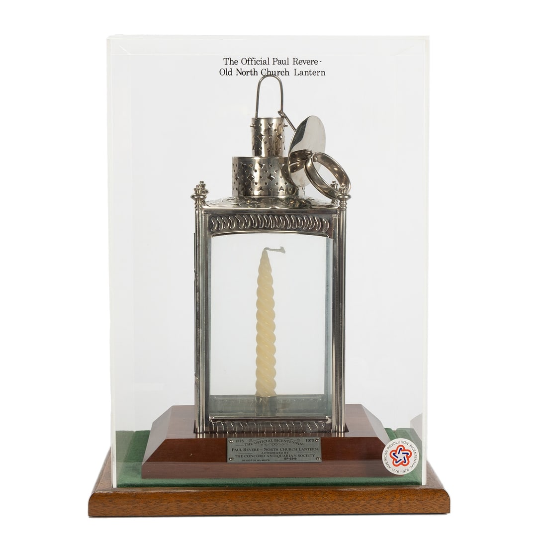 PAUL REVERE BICENTENNIAL LANTERN: PAUL REVERE BICENTENNIAL LANTERN Register number EP-2348. Silverplated version with plaque to fitted wooden base and labeled display case. 12 x 5 3/4 in. (30.5 x 14.6 cm.), Display: 17 1/2 x 11 1/2 x 