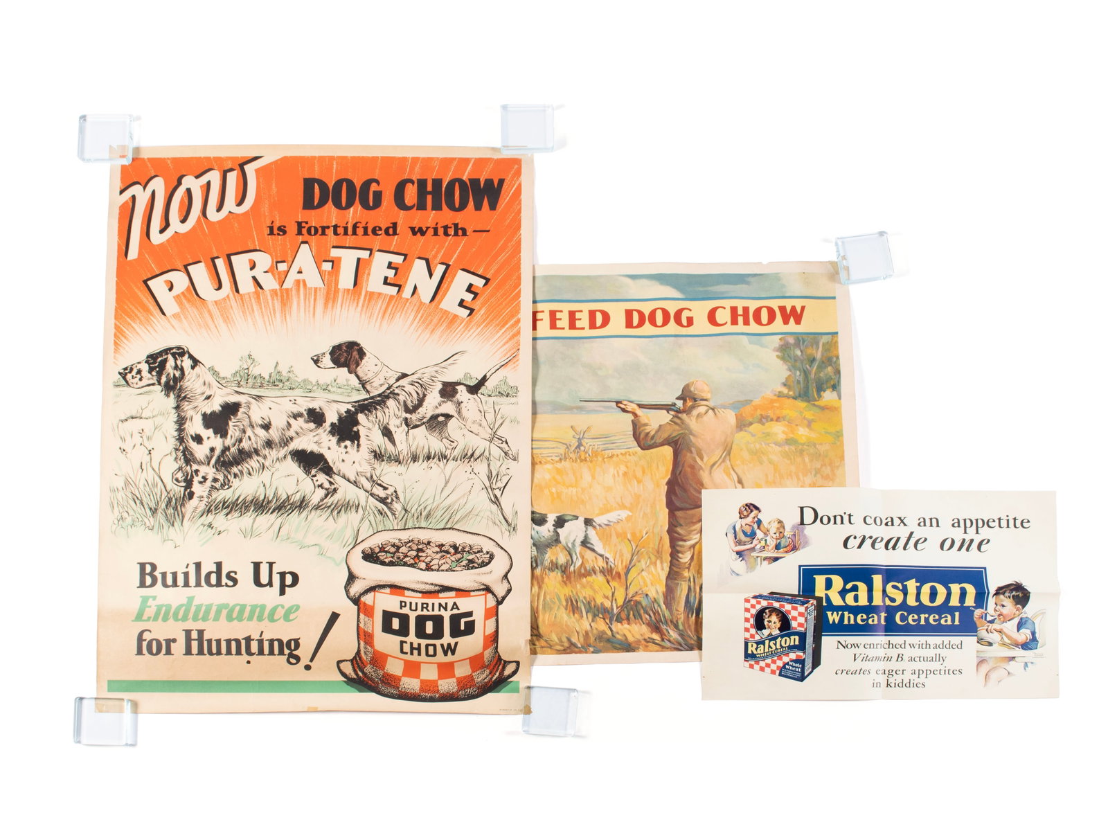 THREE PURINA DOG CHOW ADVERTISING POSTERS: THREE PURINA DOG CHOW ADVERTISING POSTERS One is a 1935 poster by Kissack with a hunter shooting ducks beside two pointers, "For Condition FEED DOG CHOW - Handy to Feed on Hunting Trips", lower right 
