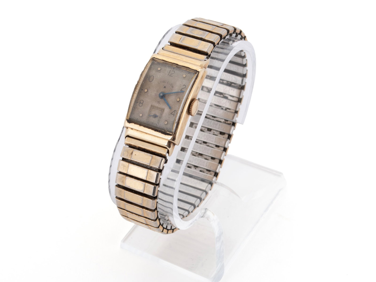 COMMEMORATIVE GOLD LORD ELGIN WRISTWATCH: COMMEMORATIVE GOLD LORD ELGIN WRISTWATCH Case marked 14K Gold S&W for Schwab & Wuischpard. Inscribed verso "Clarence Fawcett-In Appreciation of 15 years Faithful Service Ralston Purina Company -11-22-