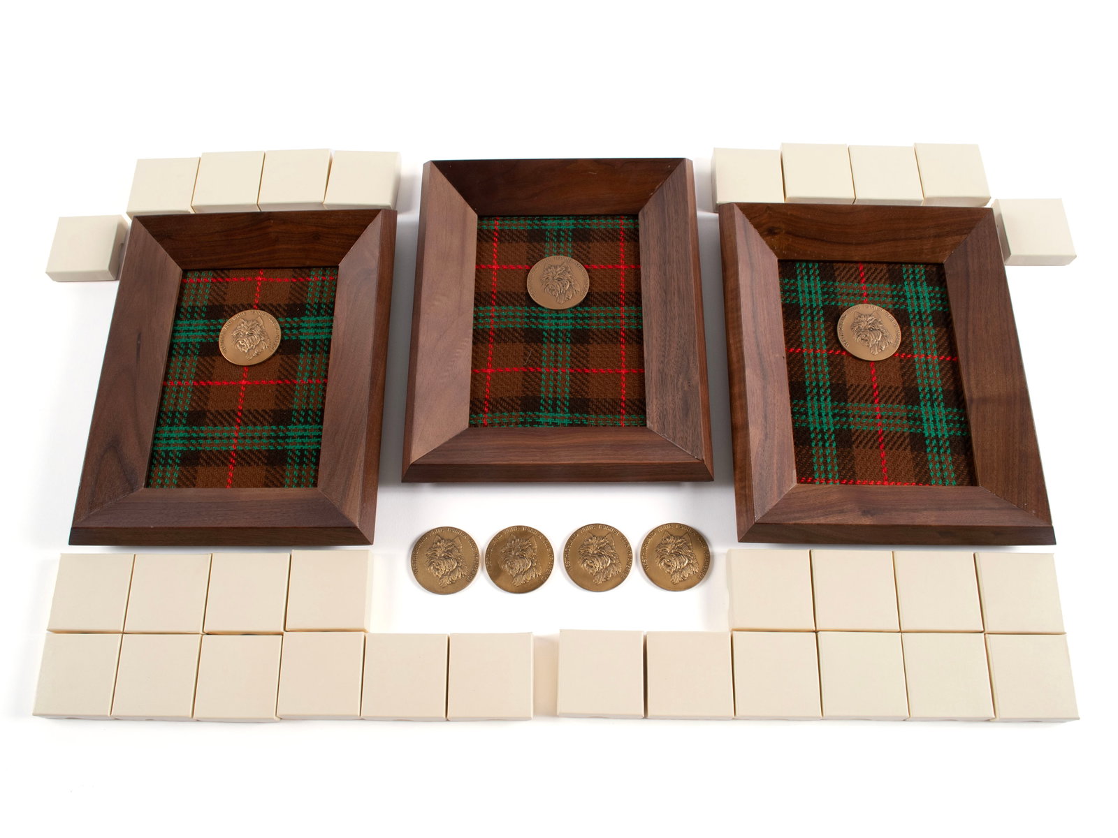 COLLECTION OF BRONZE WESTHIGHLAND WHITE TERRIER CLUB OF AMERICA MEDALS: COLLECTION OF BRONZE WESTHIGHLAND WHITE TERRIER CLUB OF AMERICA MEDALS American, 20th century. Thirty-seven (37) medals by the "Medallic Art Co. N.Y. - BRONZE", three framed and thirty (30) with origi