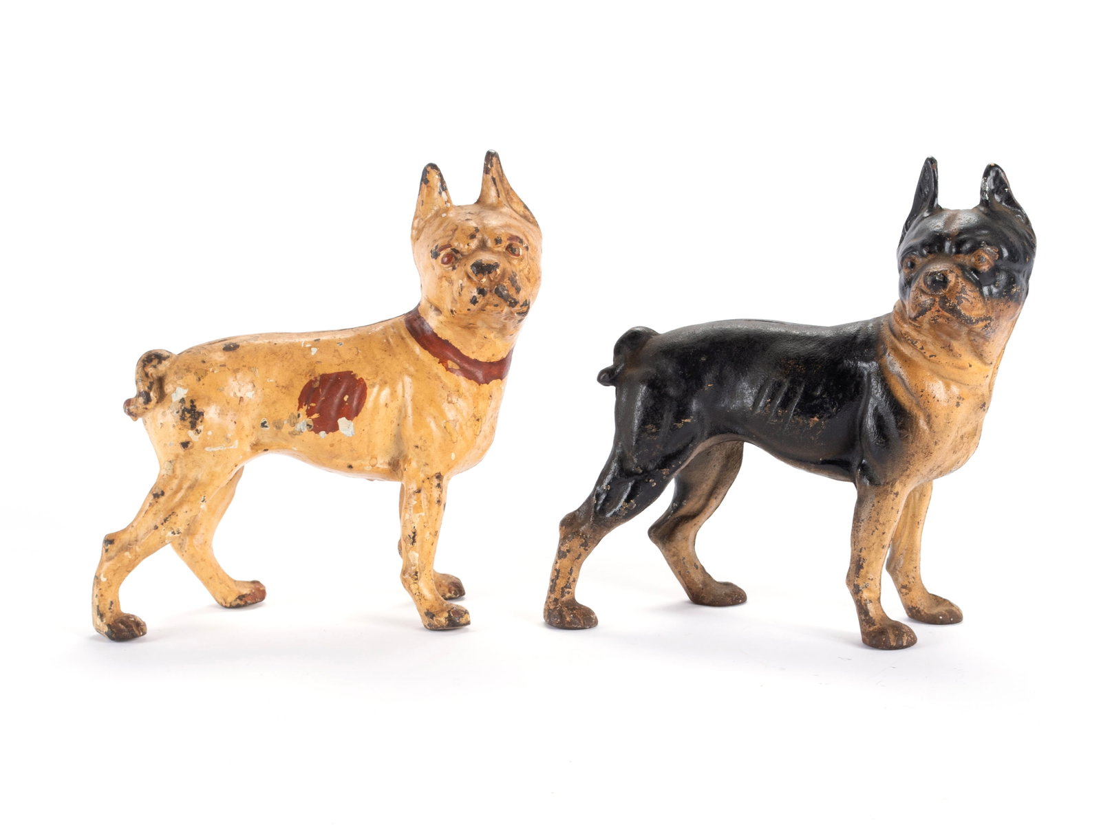 TWO TERRIER DOORSTOPS: TWO TERRIER DOORSTOPS Possibly Hubley, early 20th century. Two (2) cast iron Boston terrier doorstops. 9 1/2 x 4 x 10 in. (24.1 x 10.2 x 25.4 cm.) Provenance: Estate of Mr. Clarence Calhoun Fawcett