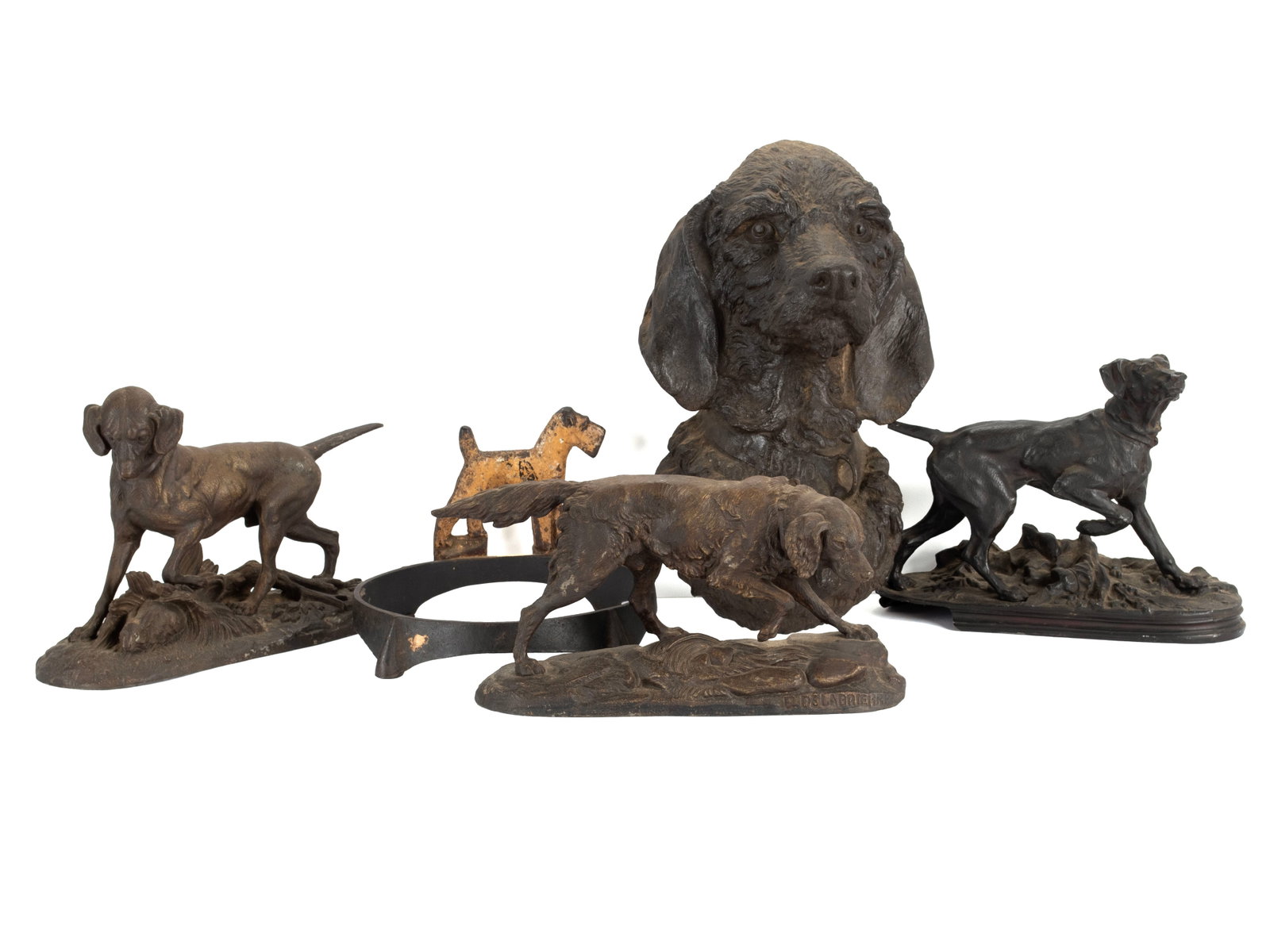 COLLECTION OF DECORATIVE METAL DOGS: COLLECTION OF DECORATIVE METAL DOGS 20th century. Including three (3) recast setter figures, one terrier bowl holder & one setter dog bust. Bust: 7 x 8 x 14 in. (17.8 x 20.3 x 35.6 cm.) Provenance: Es