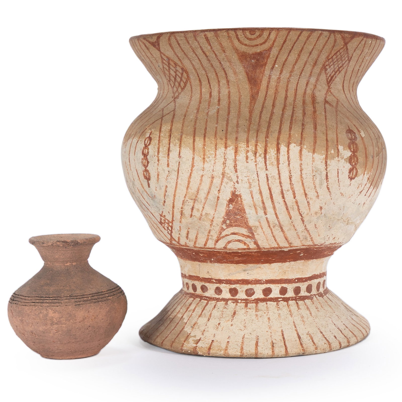 TWO BAN-CHIANG POTS: TWO BAN-CHIANG POTS Thailand, earthenware. Red and white decoration. Largest: 7 1/2 x 6 1/2 in. (19.1 x 16.5 cm.)