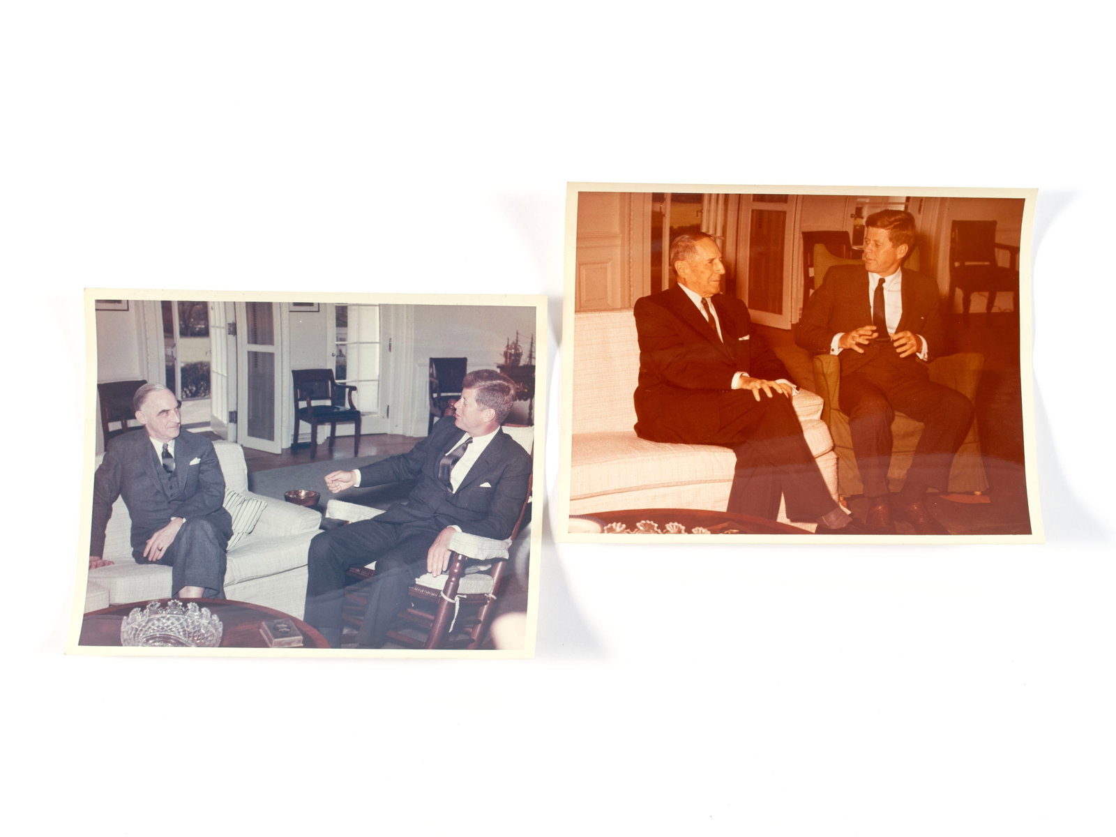 ROBERT L. KNUDSEN PRESIDENTIAL PHOTOGRAPHS WITH PRESIDENT KENNEDY: ROBERT L. KNUDSEN PRESIDENTIAL PHOTOGRAPHS WITH PRESIDENT KENNEDY Two (2) Oval Office images taken by the official White House photographer with President Kennedy seated in his rocking chair. One of