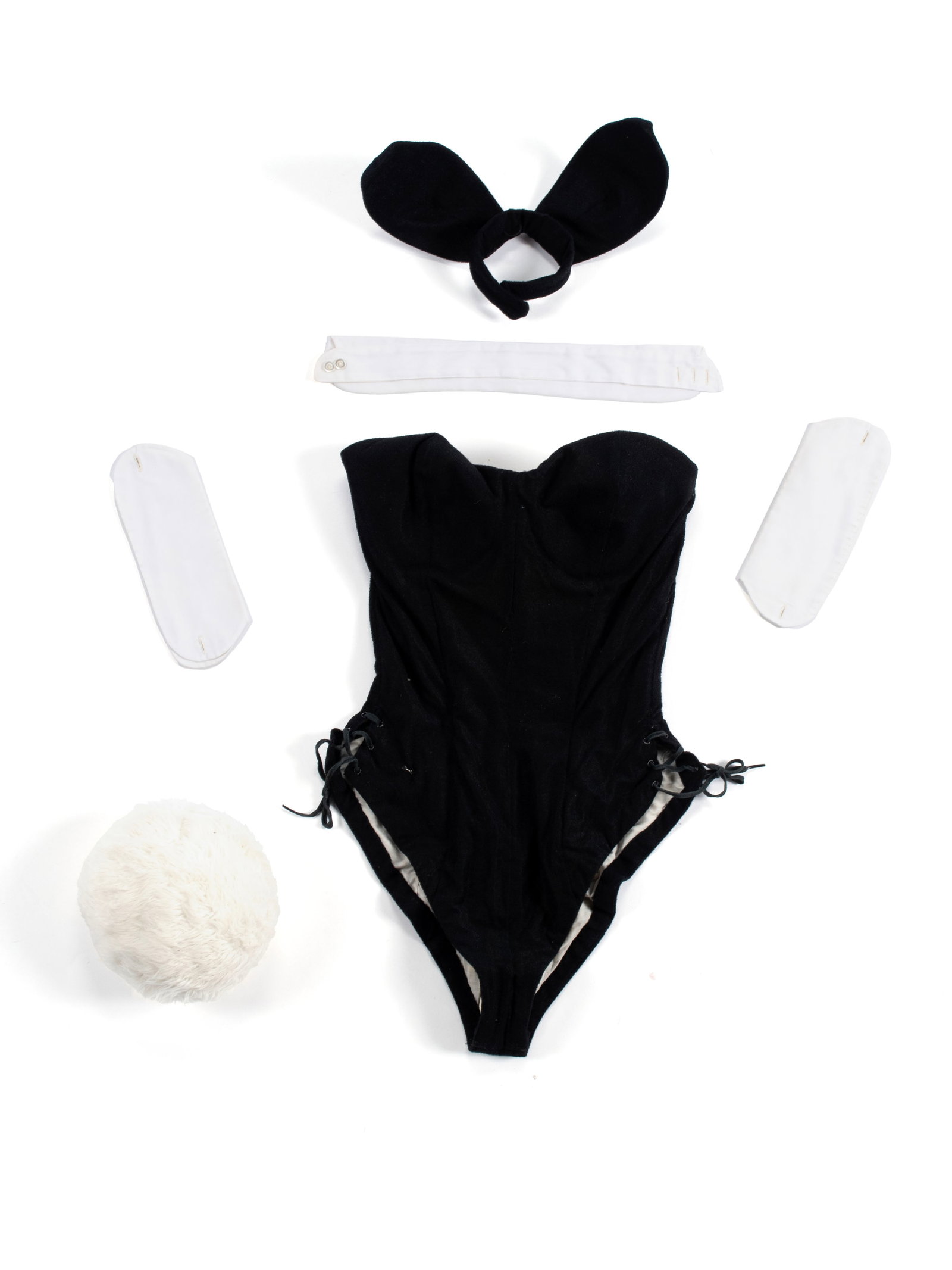 PLAYBOY BUNNY COSTUME: PLAYBOY BUNNY COSTUME Circa 1970, size 36D as marked. Bodice: 13 x 21 in. (33 x 53.3 cm.)