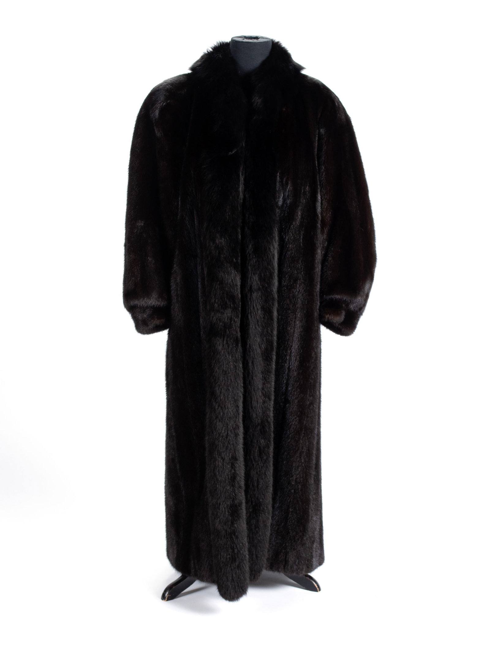 MINK COAT: MINK COAT Dark brown full-length coat, marked size 8. 20 x 53 in. (50.8 x 134.6 cm.)