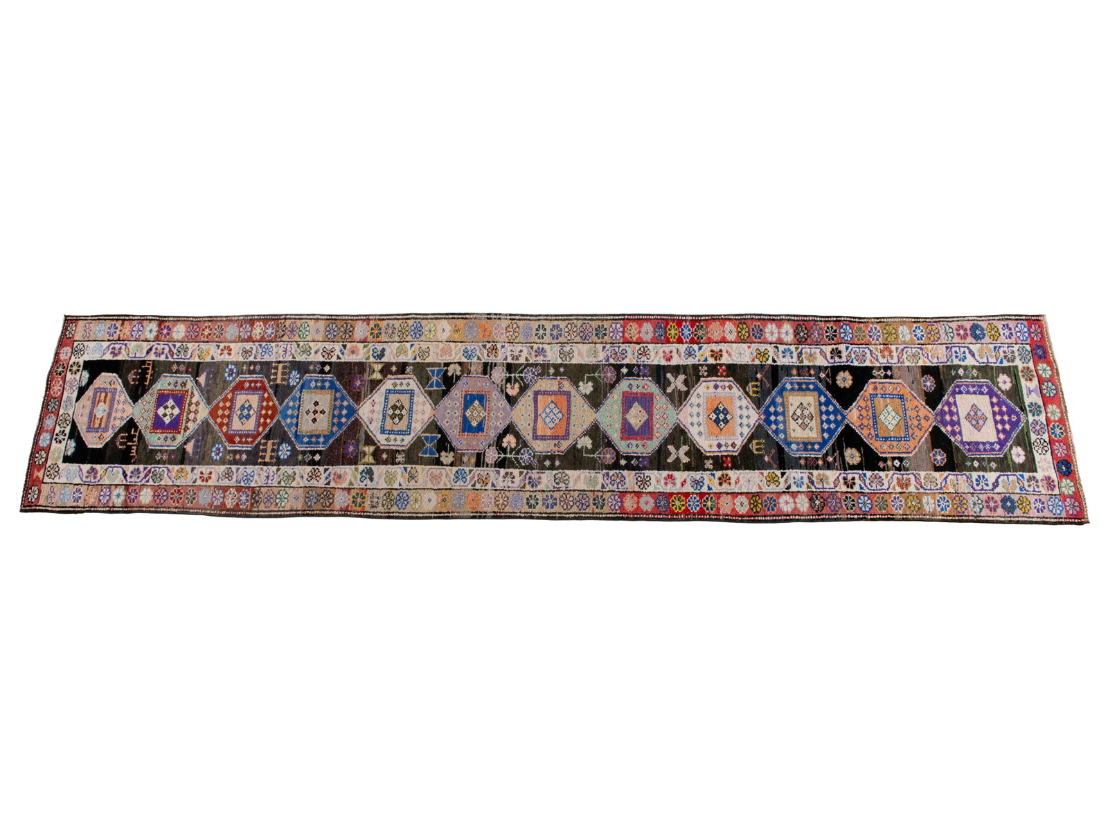 TURKISH LONG RUG WITH SILVER THREAD HIGHLIGHTS: TURKISH LONG RUG WITH SILVER THREAD HIGHLIGHTS Turkish, 20th century. Colorful geometric medallions run the grey abrash field, ivory inner border and colorful outer border decorated with floral medall