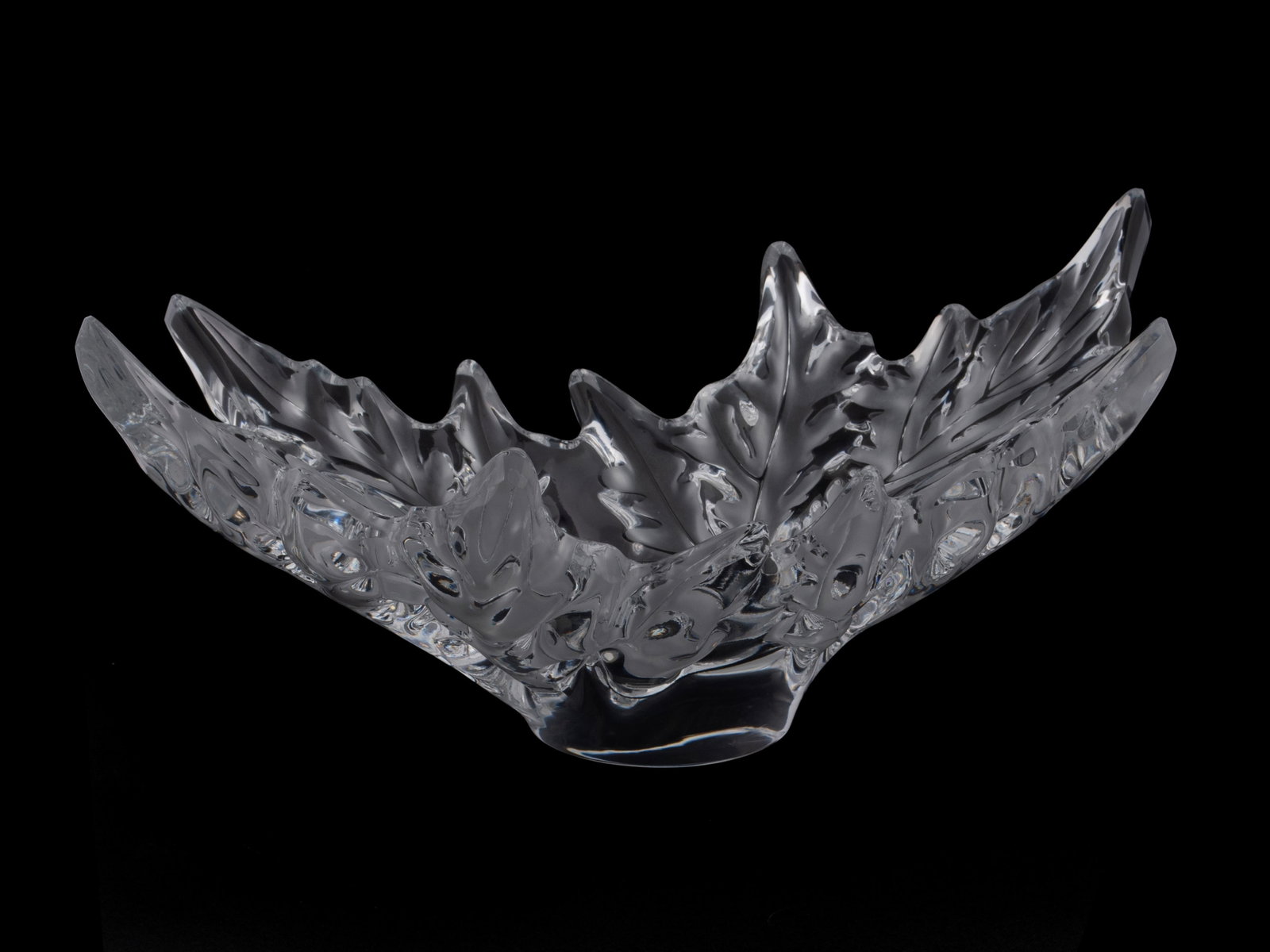 LALIQUE CHAMPS ELYSEES CENTERPIECE BOWL: LALIQUE CHAMPS ELYSEES CENTERPIECE BOWL France, 20th century, signed "Lalique - France". Leaf-form decorative bowl. 7 1/2 x 18 1/4 x 9.90 in. (19.1 x 46.4 x 25.1 cm.)