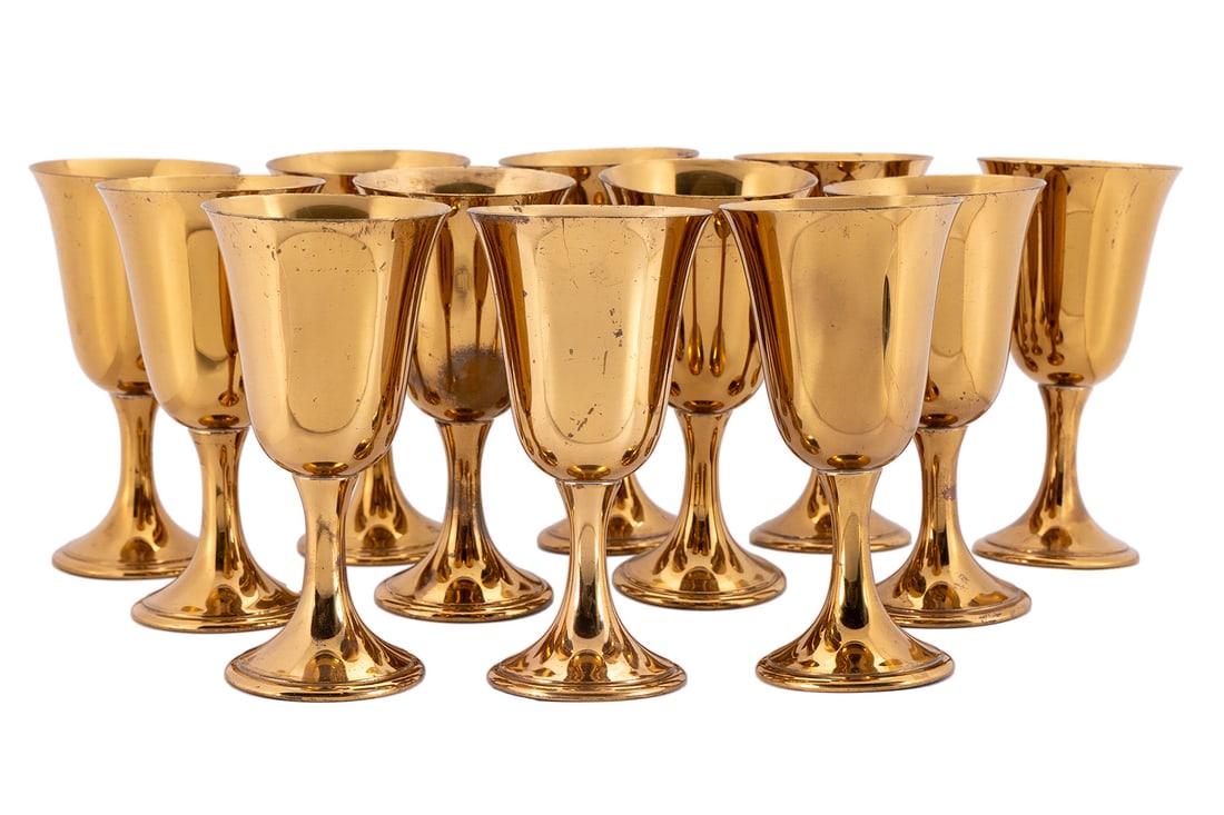 SET OF GORHAM 'GIFTWARE' GOBLETS: SET OF GORHAM 'GIFTWARE' GOBLETS American, 20th century. Set of twelve (12) gold finished metal goblets, marked on underside and numbered L433. 6 3/4 in. (17.1 cm.)