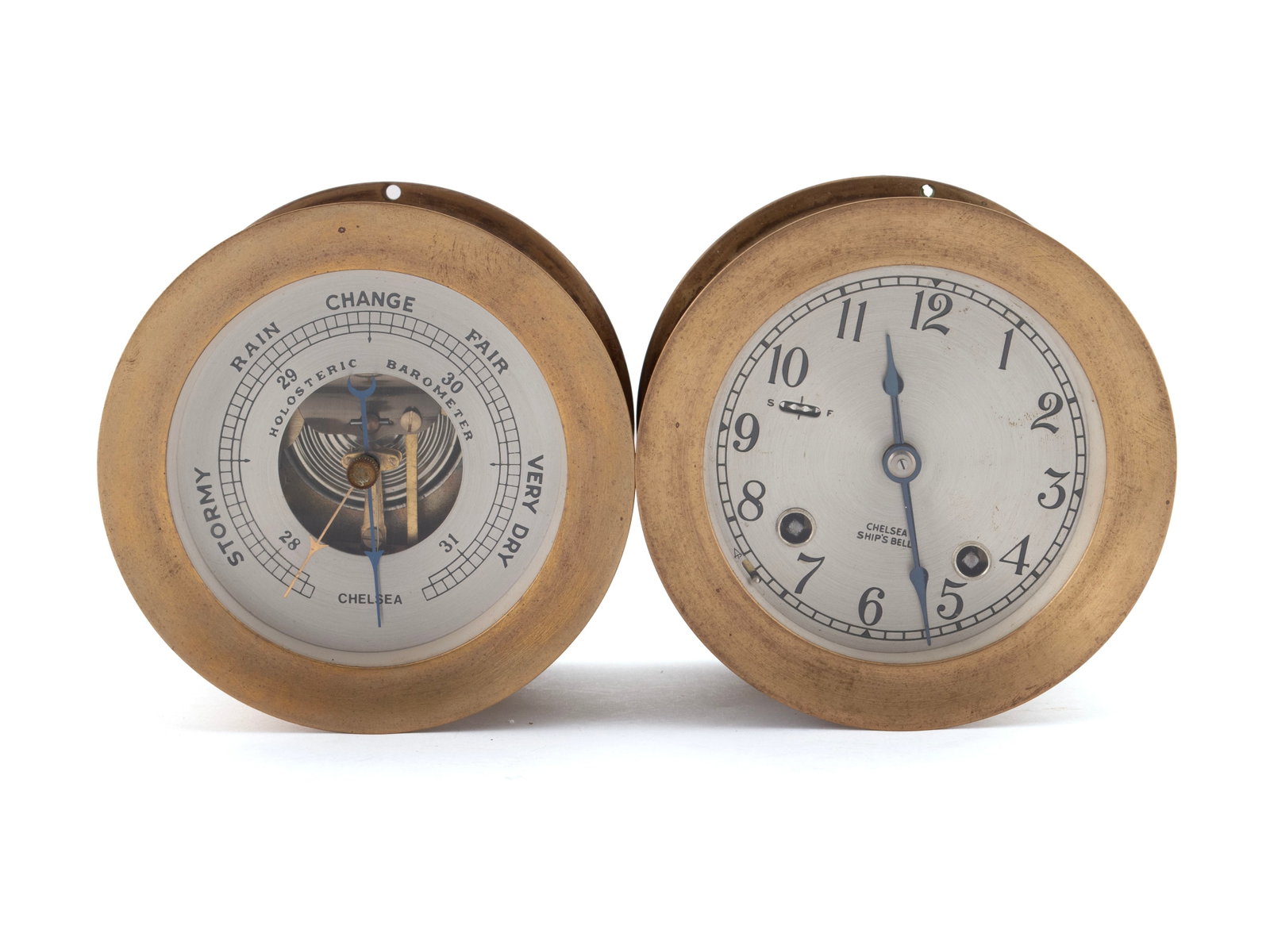 CHELSEA SHIPS BELL AND BAROMETER: CHELSEA SHIPS BELL AND BAROMETER English, 20th century. Brass cased ship's bell clock and halosteric barometer, both marked on dial. 3 1/4 x 4 3/4 in. (8.3 x 12.1 cm.)