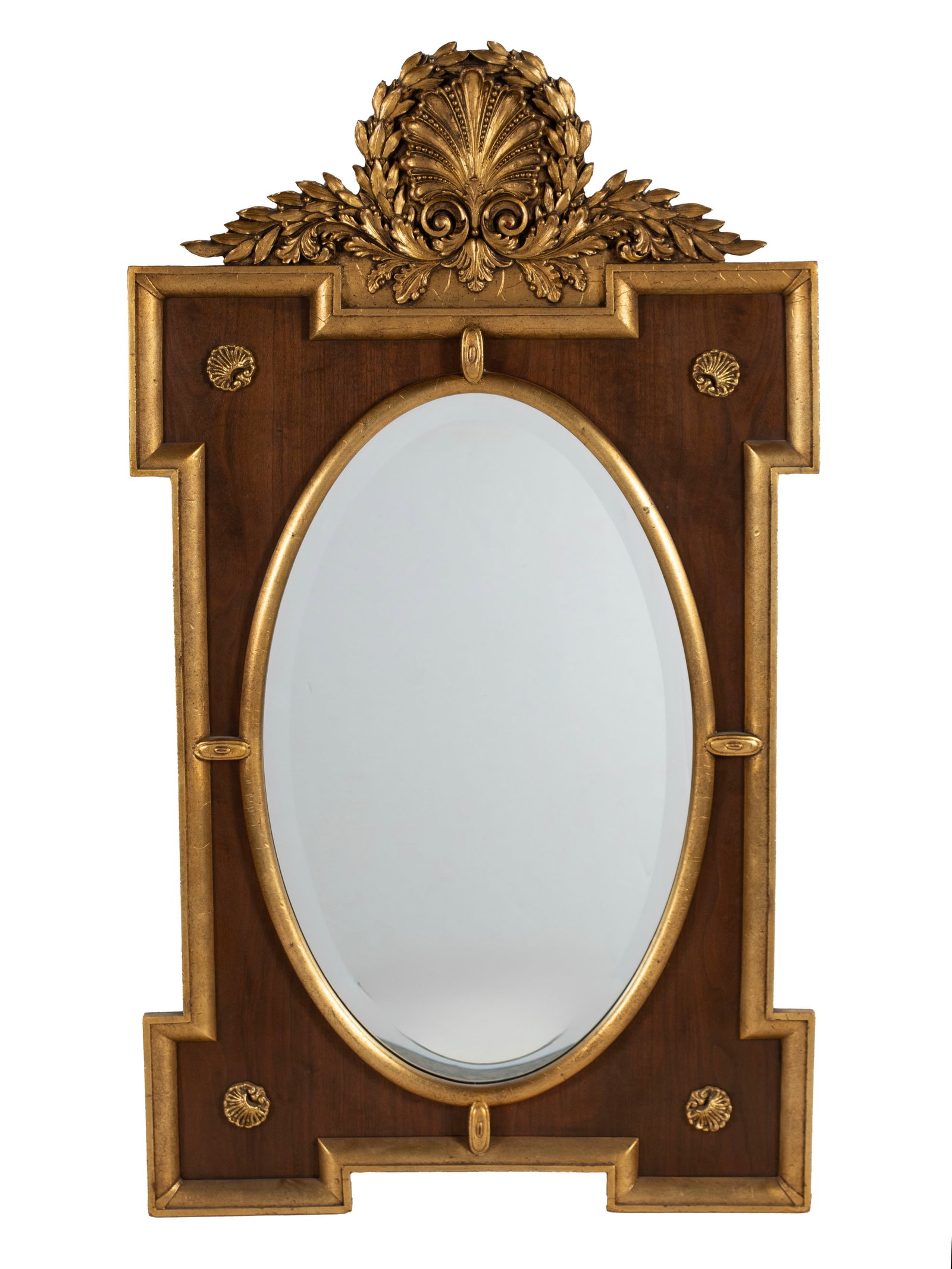 NEOCLASSICAL STYLE MIRROR: NEOCLASSICAL STYLE MIRROR American, 20th century, walnut with gilt highlights. Large shell form crest surrounded by foliate highlights, notched to all four sides, with shell form gilt medallions decor