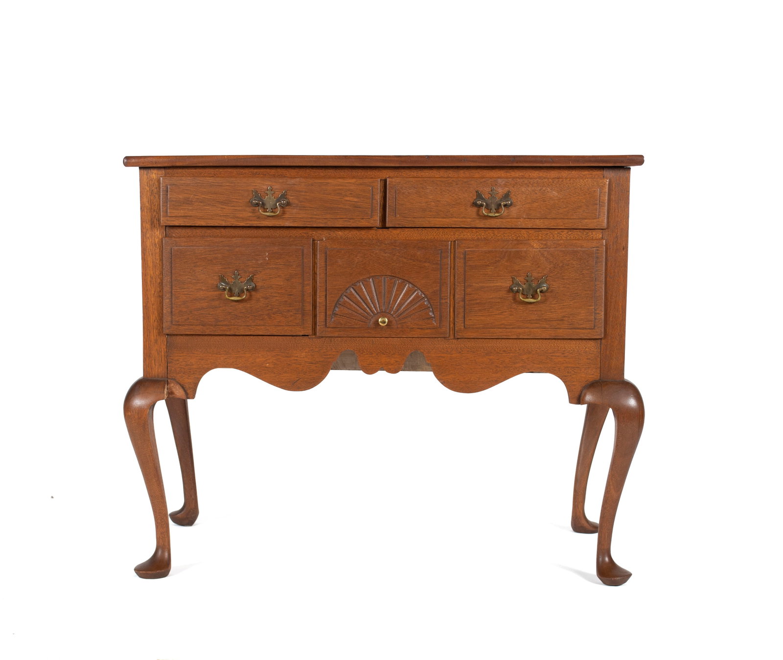 QUEEN ANNE STYLE LOWBOY: QUEEN ANNE STYLE LOWBOY American, 19th/20th century. Rectangular case with five drawers, the bottom center drawer with fan carved front, with exaggerated rolling front apron on cabriole legs ending