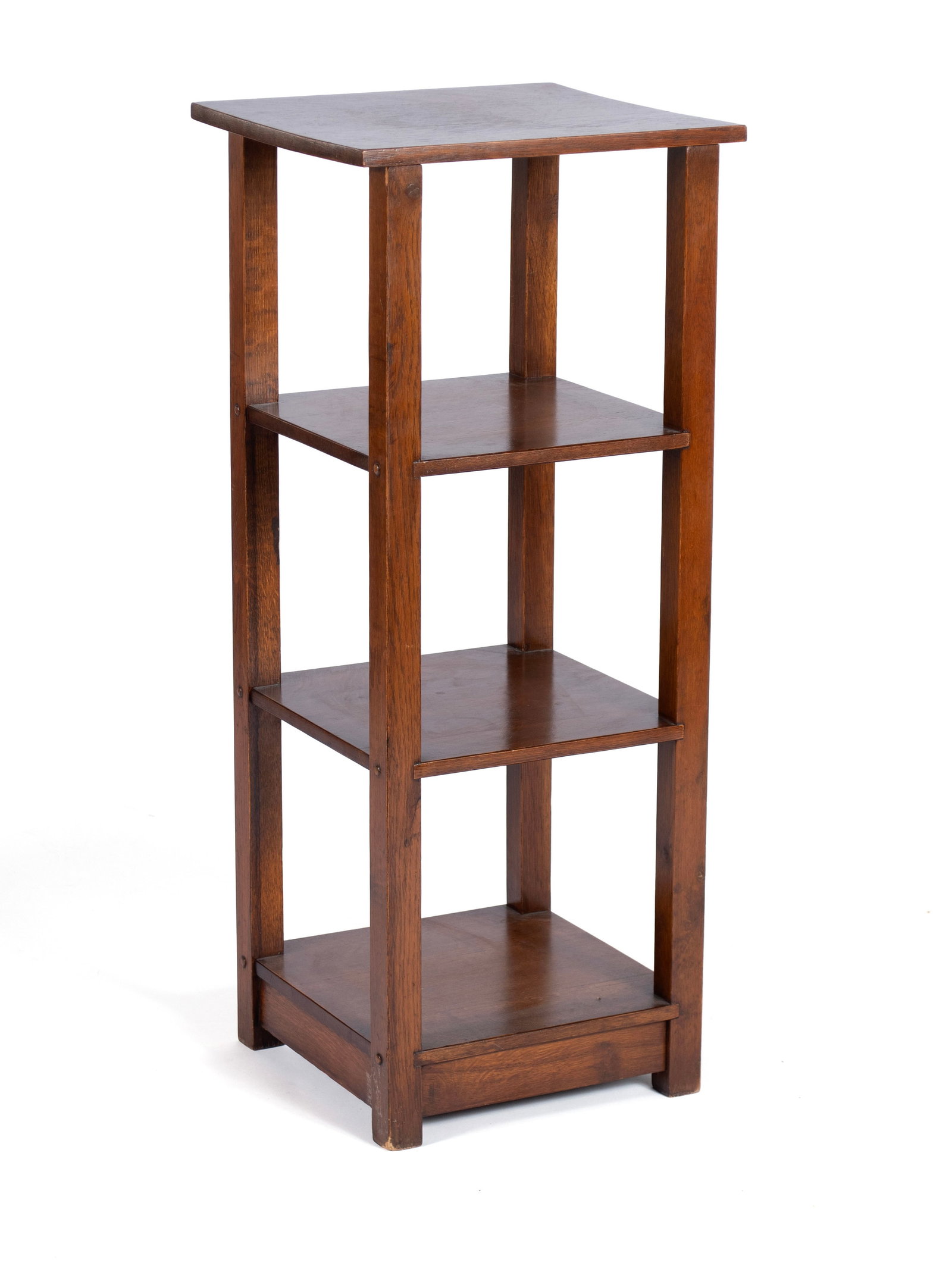 ARTS & CRAFTS LAKESIDE CRAFTS SHOP THREE-TIERED SIDE TABLE: ARTS & CRAFTS LAKESIDE CRAFTS SHOP THREE-TIERED SIDE TABLE Sheboygan, Wisconsin, circa 1910, oak. Label to underside. 36 x 14 1/4 x 15 in. (91.4 x 36.2 x 38.1 cm.)