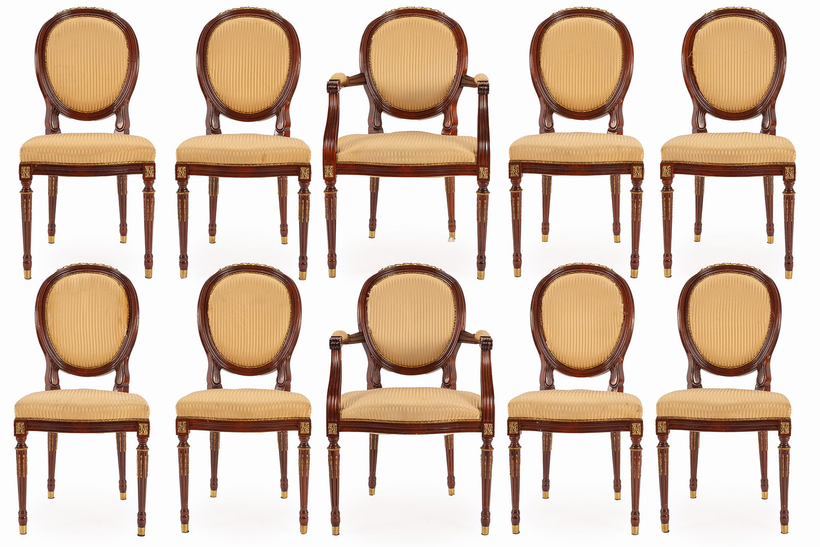 SET OF TEN LOUIS XVI STYLE DINING CHAIRS: SET OF TEN LOUIS XVI STYLE DINING CHAIRS Continental, 20th century. Oval padded backs over the matching serpentine front seats, on tapering fluted legs with gilt finish highlights. 39 x 18 1/2 x 18