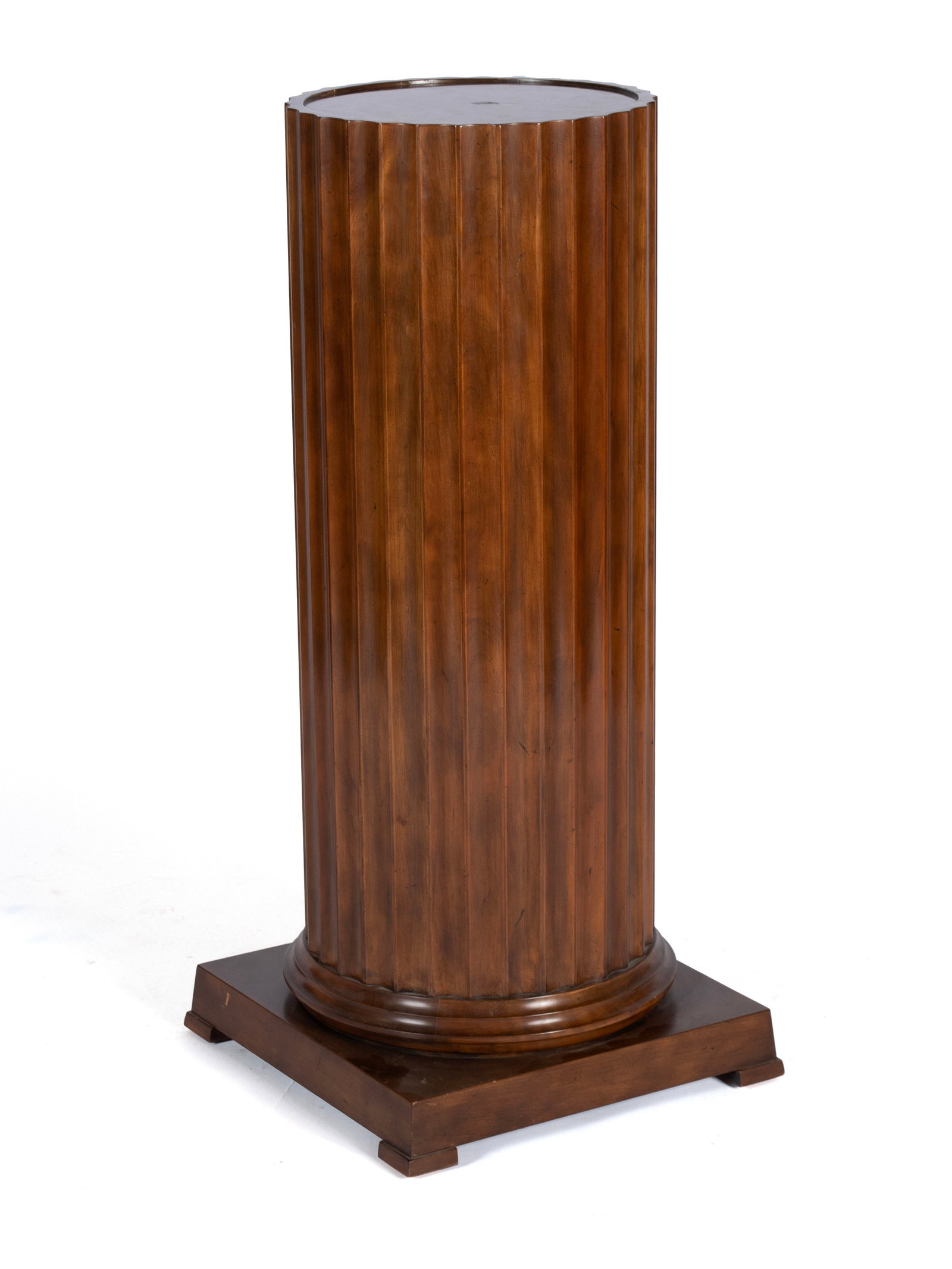 BAKER FLUTED COLUMN PEDESTAL: BAKER FLUTED COLUMN PEDESTAL American, 20th century. Round fluted column on a square base, with Baker tags to underside. 36 x 16 1/2 x 16 1/2 in. (91.4 x 41.9 x 41.9 cm.)