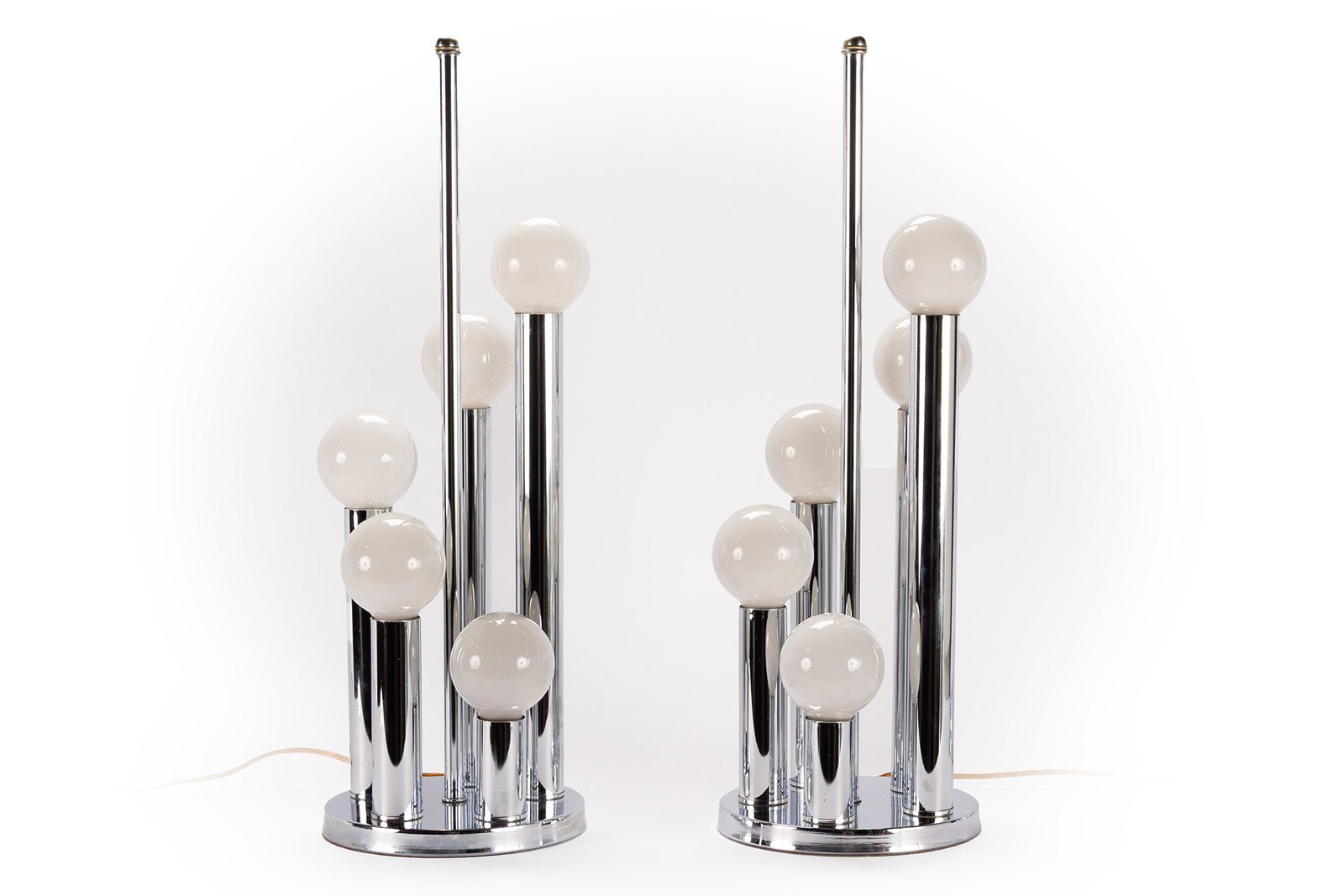 PAIR OF SPACE AGE DESIGN TABLE LAMPS: PAIR OF SPACE AGE DESIGN TABLE LAMPS 20th century, chrome five tube lamps with globe bulbs in the manner of Robert Sonneman. 23 1/2 x 8 in. (59.7 x 20.3 cm.)